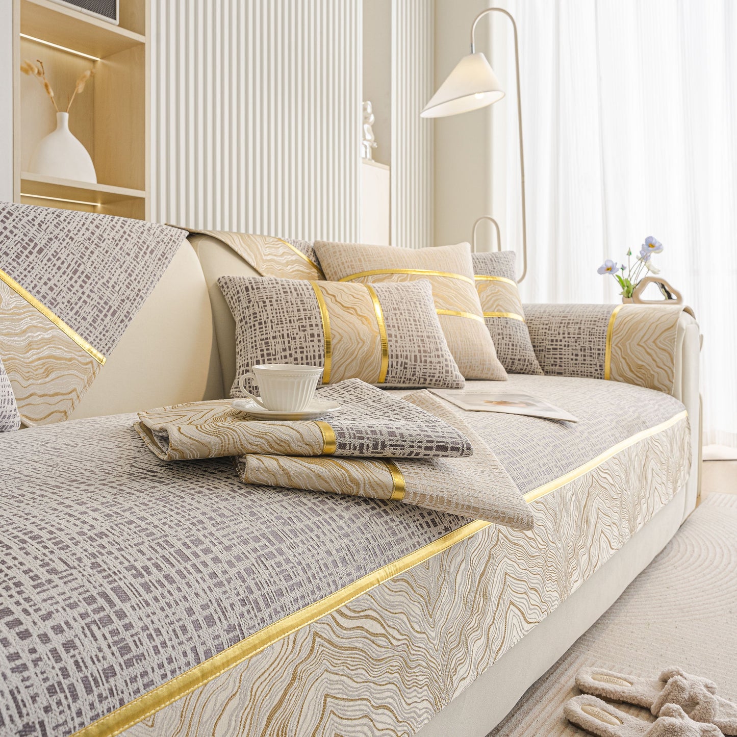 Modern Non-Slip Couch Slipcover, Soft, Durable & Washable Furniture Protector with gold marble-style trim on sofa