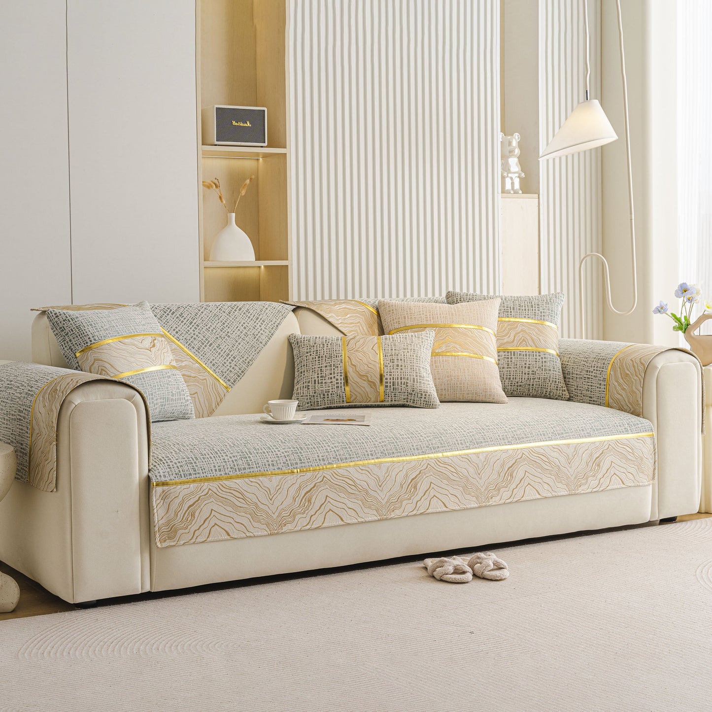 Modern Non-Slip Couch Slipcover, Soft, Durable & Washable Furniture Protector on beige sofa with gold marble-style trim