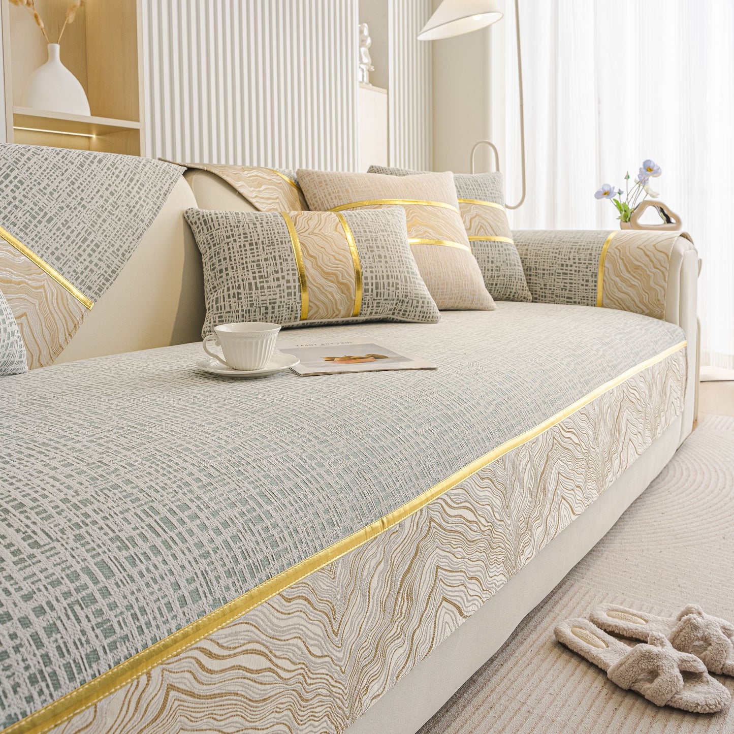 Modern Non-Slip Couch Slipcover, Soft, Durable & Washable Furniture Protector with gold marble trim on a stylish chenille fabric.