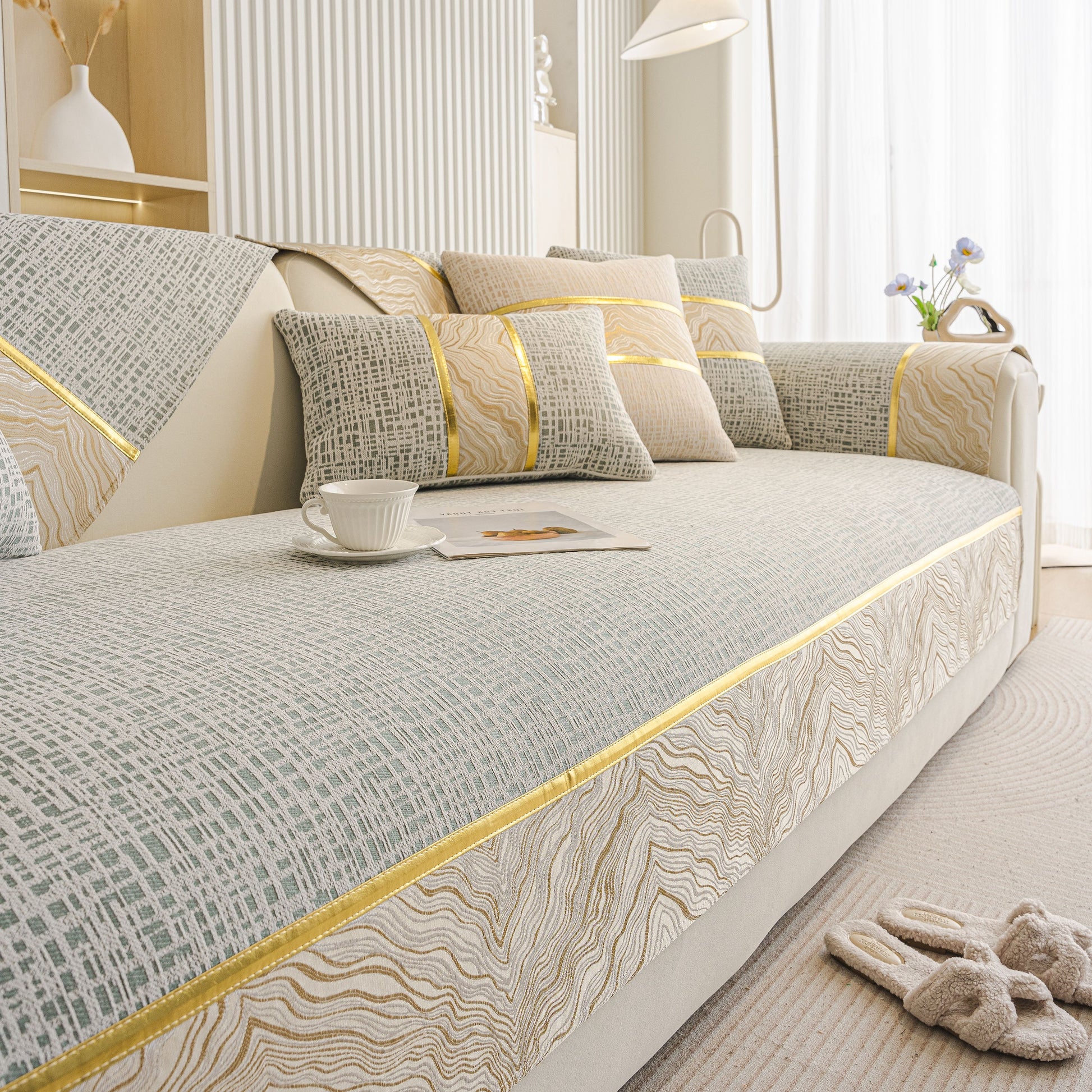 Modern Non-Slip Couch Slipcover, Soft, Durable & Washable Furniture Protector with gold marble trim on a stylish chenille fabric.