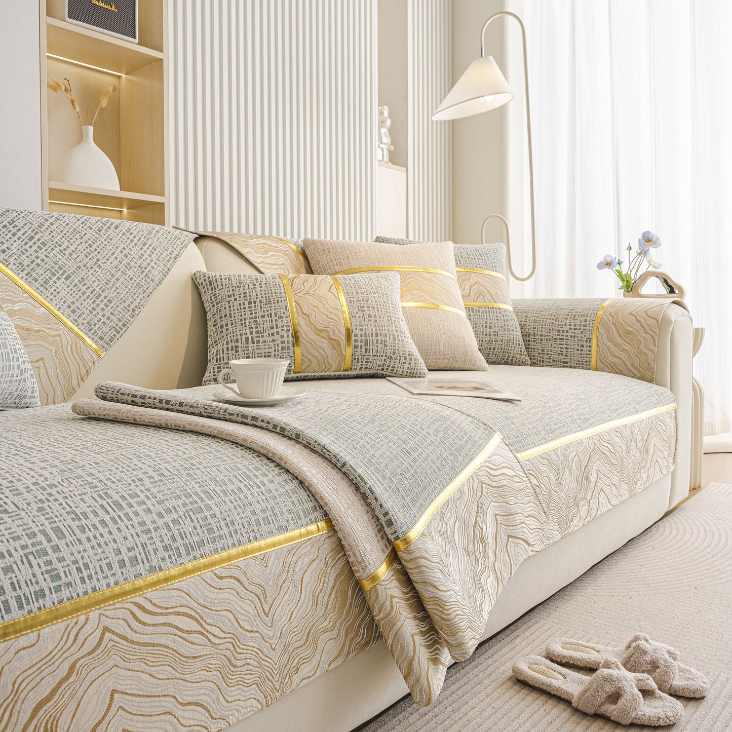 Modern Non-Slip Couch Slipcover, Soft, Durable & Washable Furniture Protector with gold marble trim on a stylish sofa