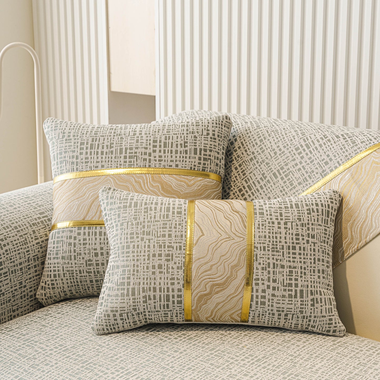 Modern Non-Slip Couch Slipcover, Soft, Durable & Washable Furniture Protector with gold marble-style trim and chenille texture.