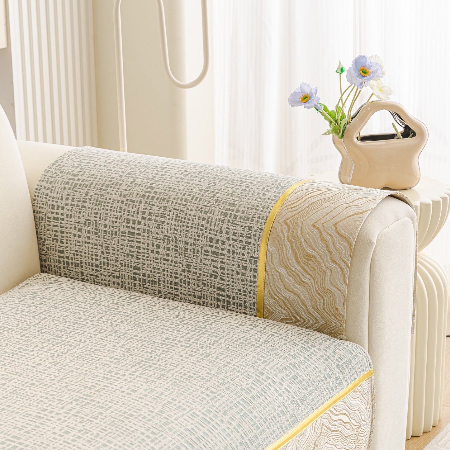 Modern Non-Slip Couch Slipcover, Soft, Durable & Washable Furniture Protector with gold marble-style trim on sofa