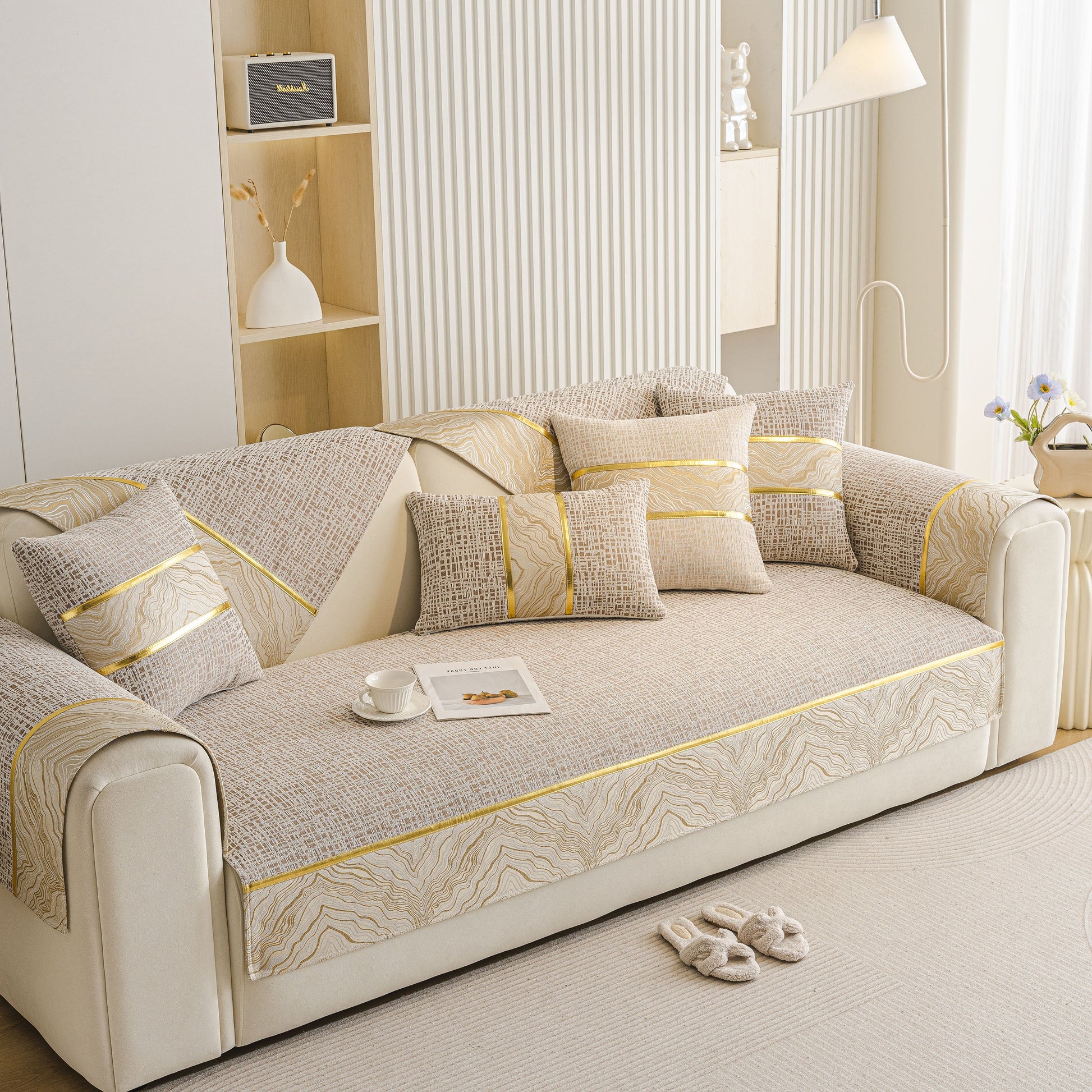 Modern Non-Slip Couch Slipcover, Soft, Durable & Washable Furniture Protector with gold marble-style trim on sofa