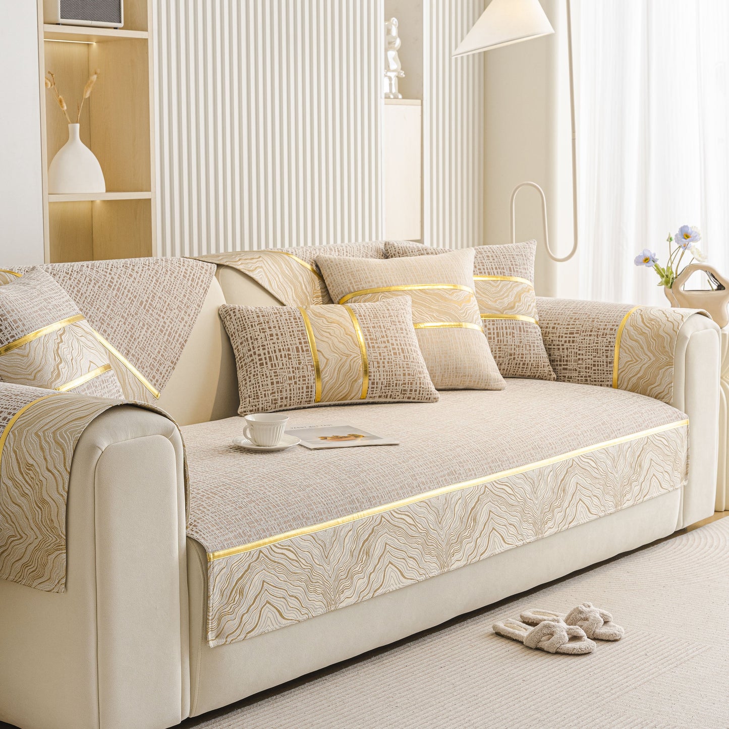 Modern Non-Slip Couch Slipcover, Soft, Durable & Washable Furniture Protector with gold marble trim on a sofa