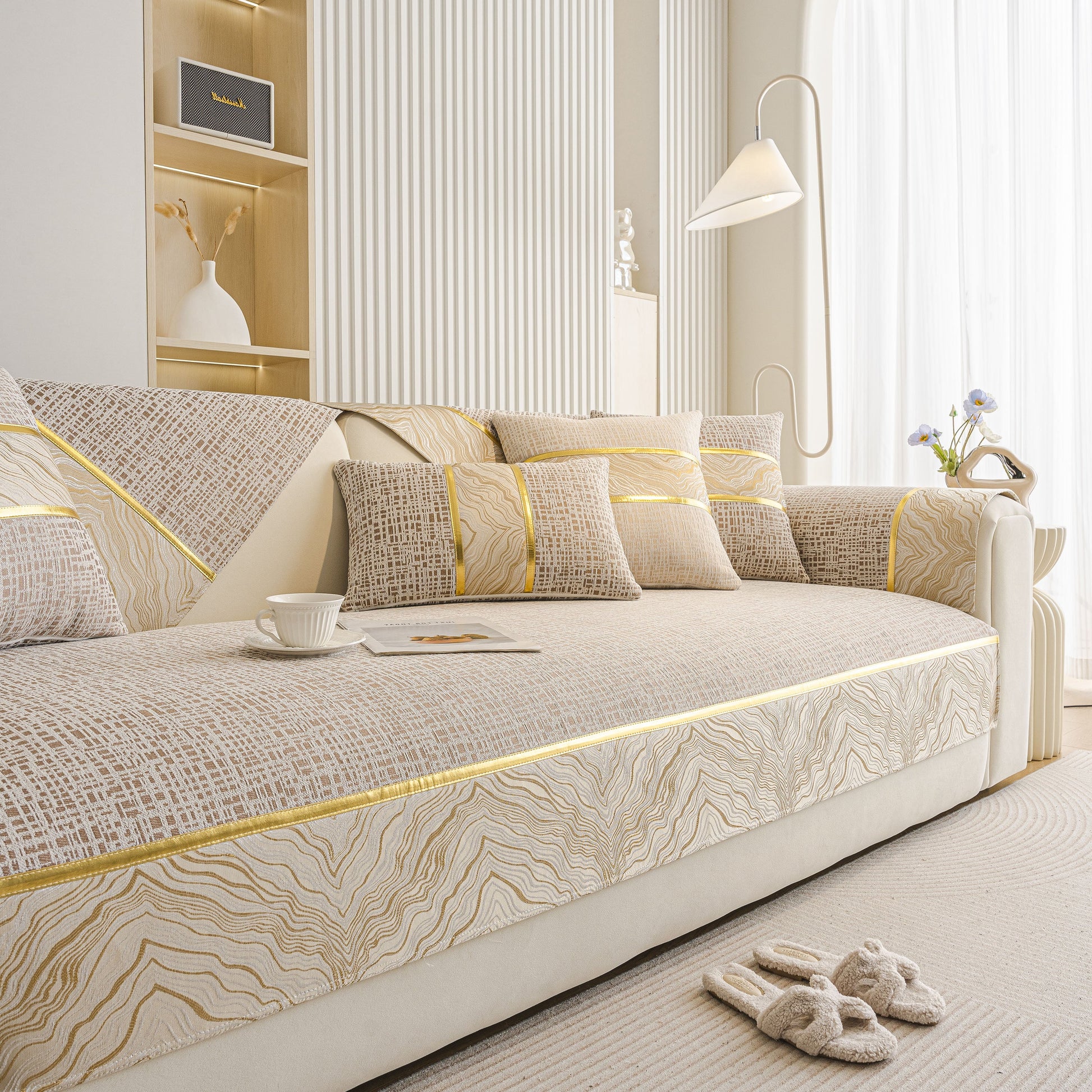 Modern Non-Slip Couch Slipcover, Soft, Durable & Washable Furniture Protector with marble-style trim on sofa.