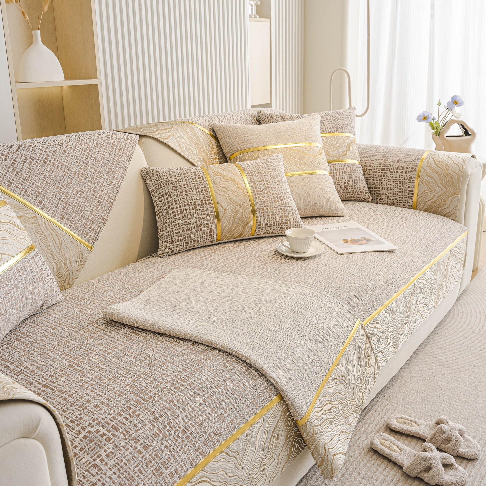 Modern Non-Slip Couch Slipcover, Soft, Durable & Washable Furniture Protector with gold marble trim on beige chenille sofa.