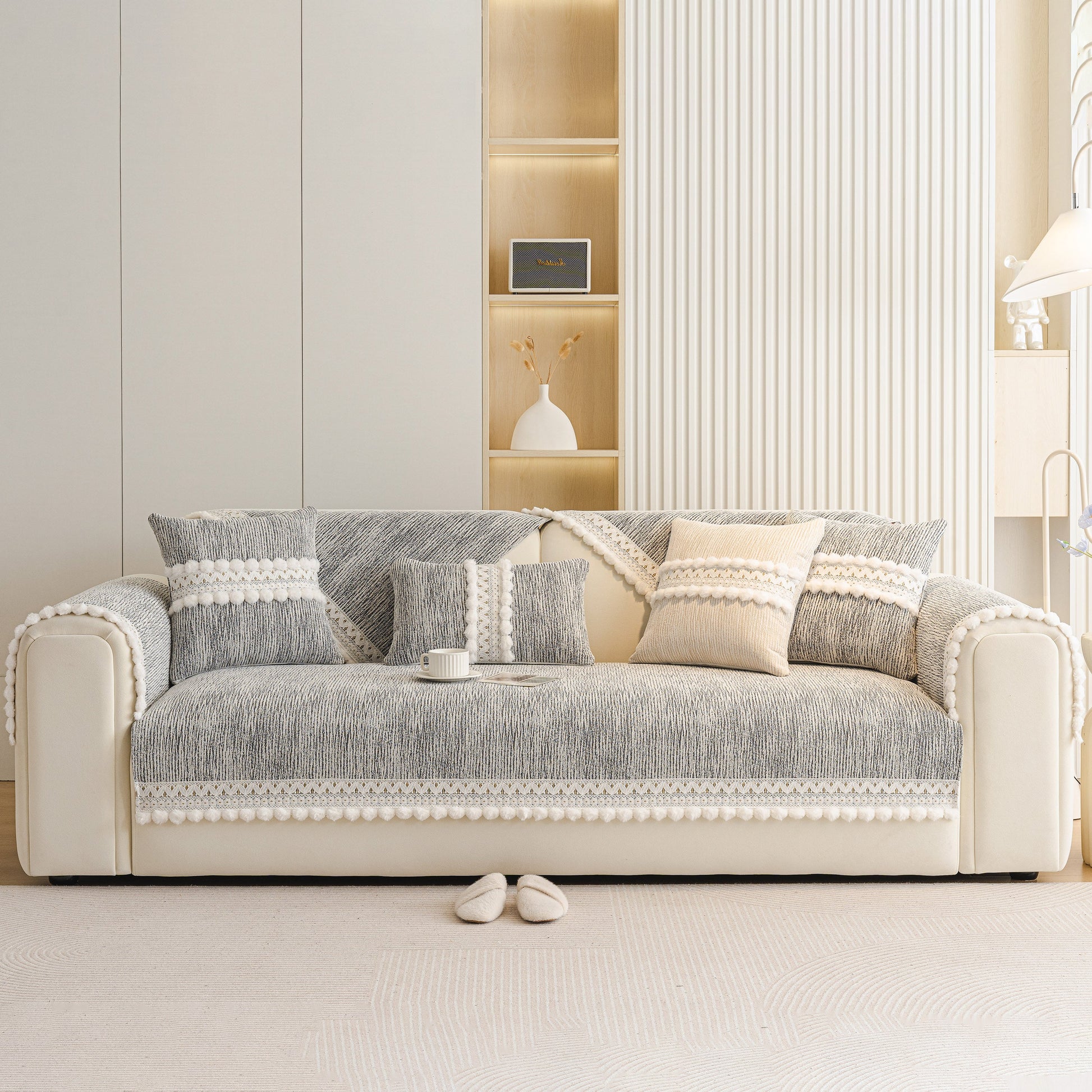 Soft Chenille Sectional Sofa Cover with Pom Pom Trim – Non-Slip Couch Protector featuring raised stripes and decorative fringe.
