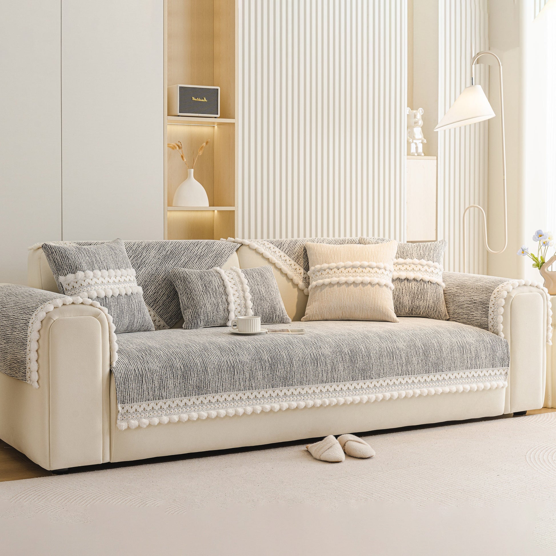 Soft Chenille Sectional Sofa Cover with Pom Pom Trim – Non-Slip Couch Protector in a modern room setting.