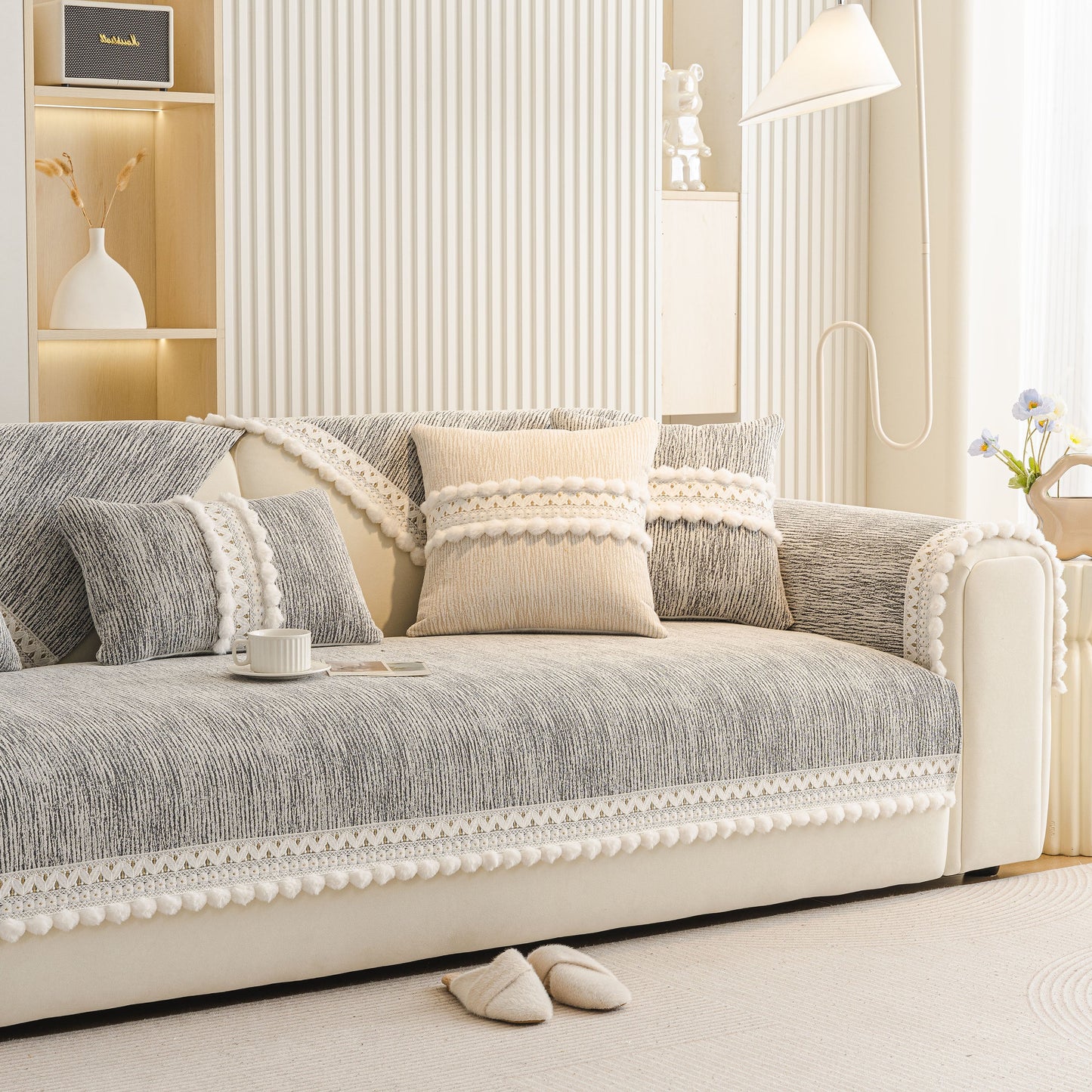 Soft Chenille Sectional Sofa Cover with Pom Pom Trim – Non-Slip Couch Protector in a modern living room setting.