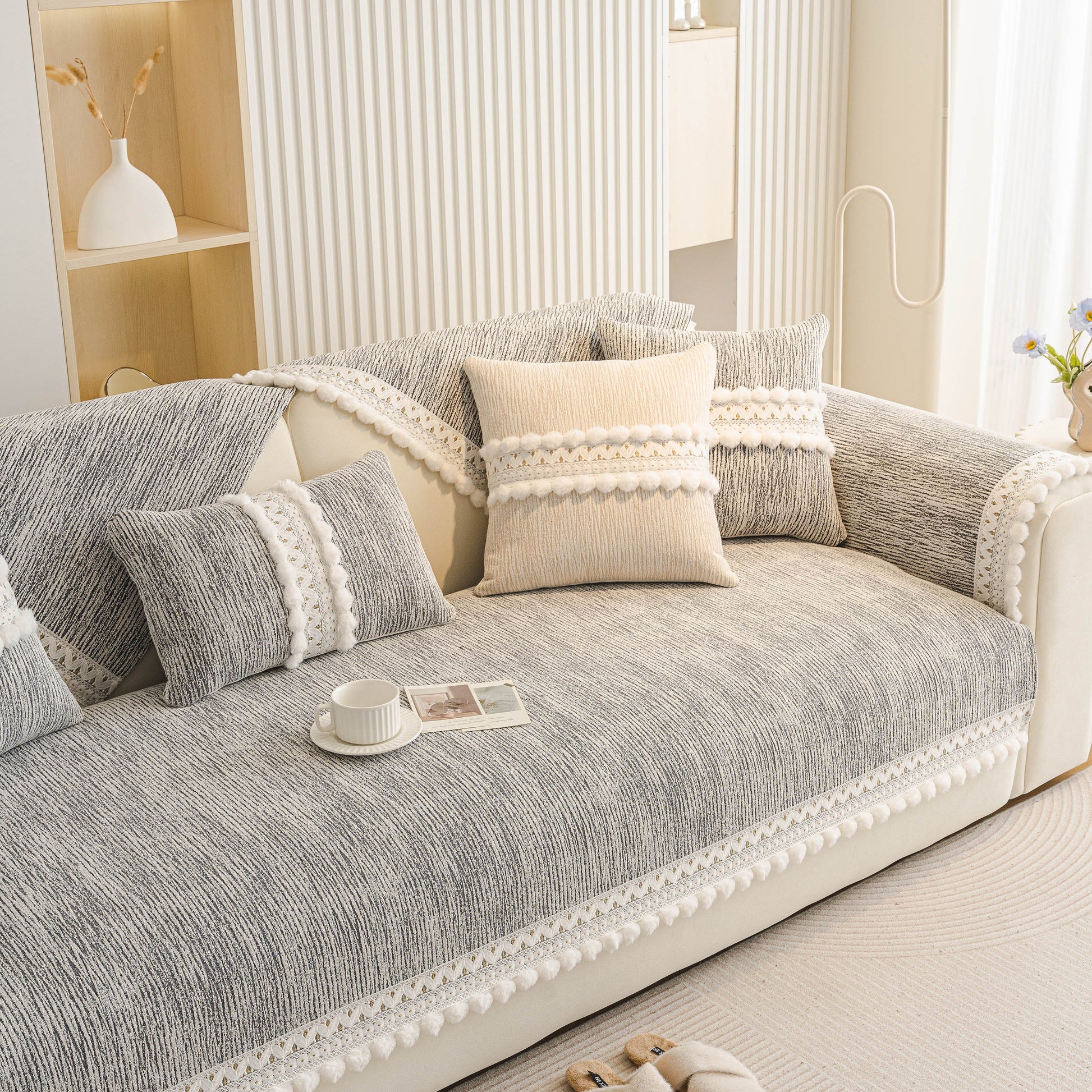 Soft Chenille Sectional Sofa Cover with Pom Pom Trim – Non-Slip Couch Protector on modern sofa.