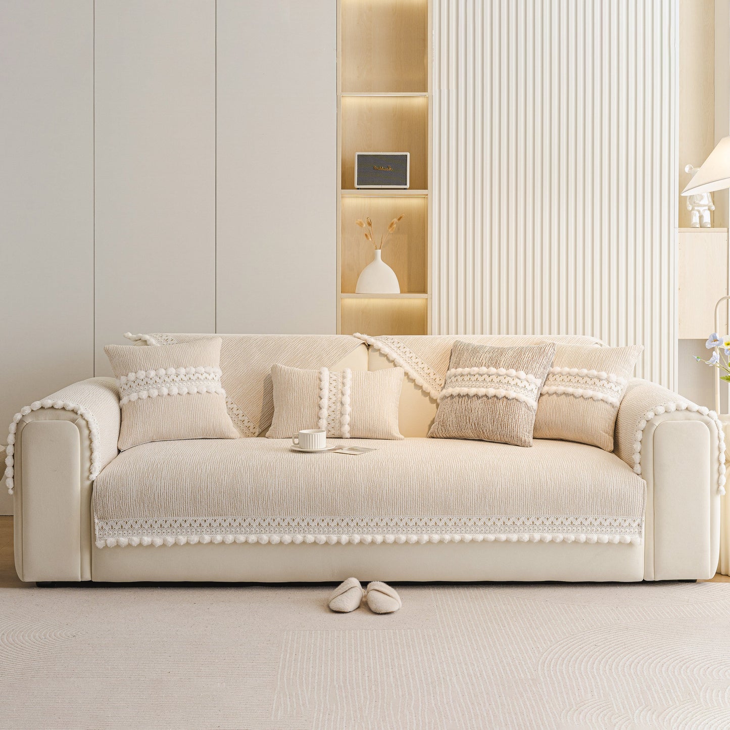 Soft Chenille Sectional Sofa Cover with Pom Pom Trim – Non-Slip Couch Protector in a modern living room