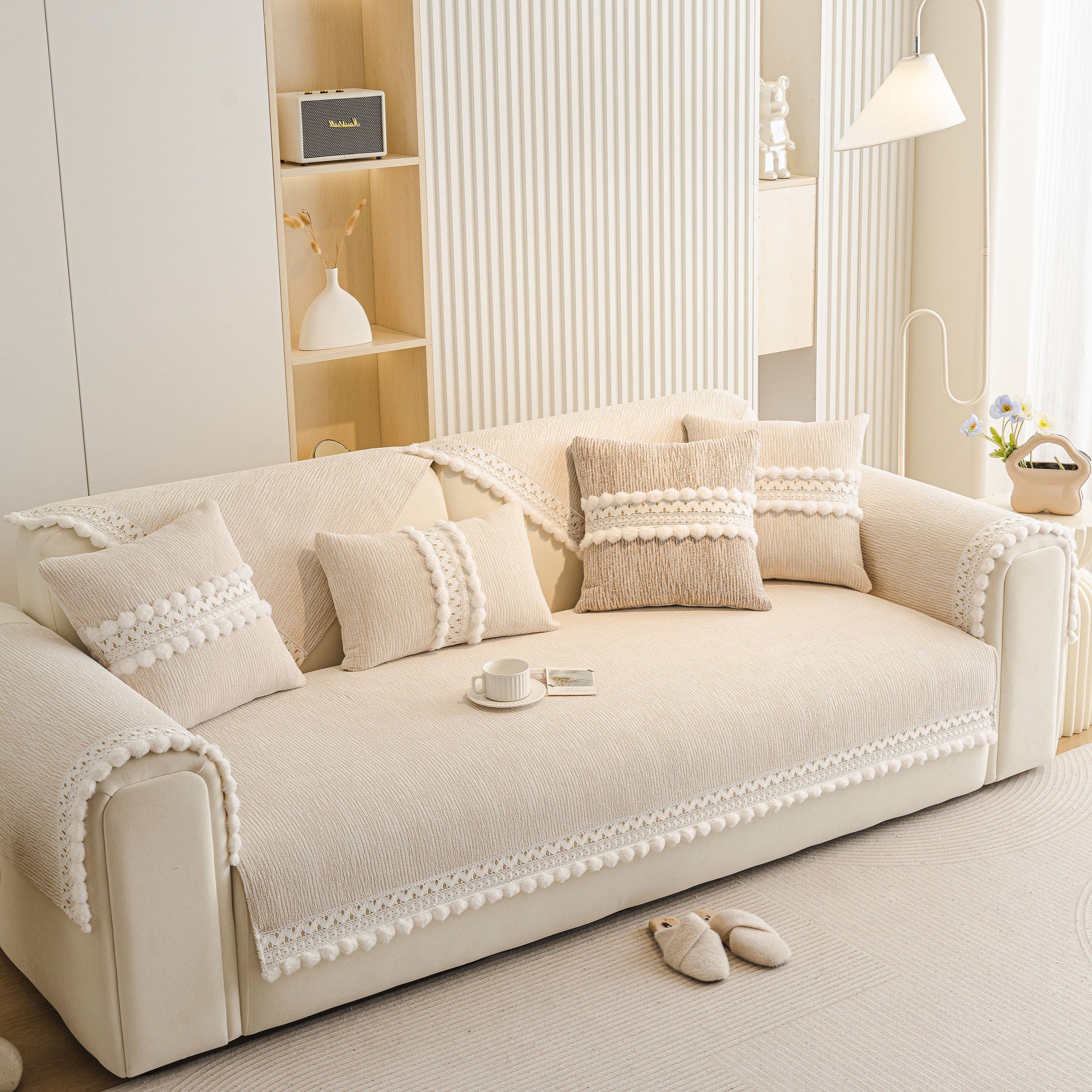 Soft Chenille Sectional Sofa Cover with Pom Pom Trim – Non-Slip Couch Protector displayed in a modern living room setting