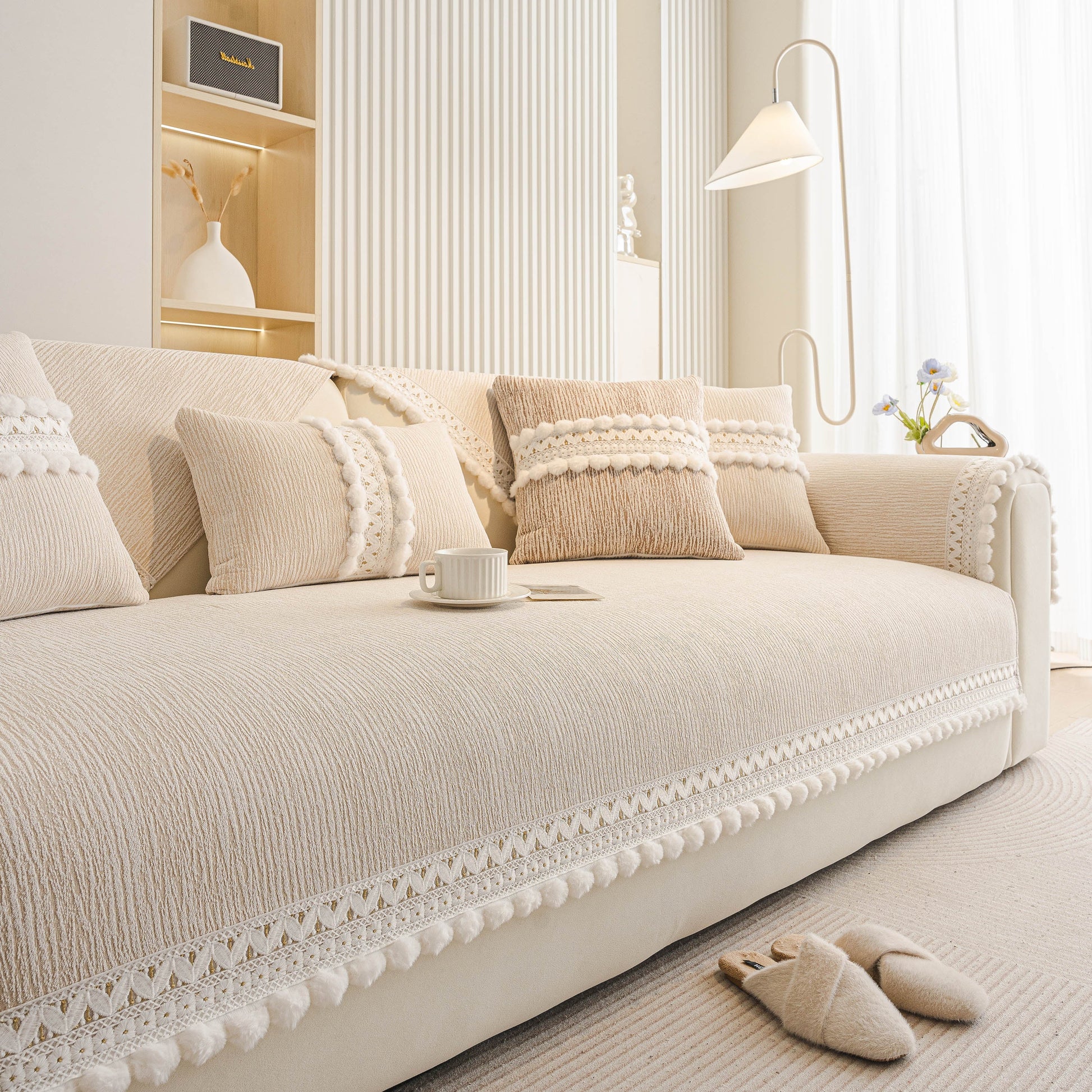 Soft Chenille Sectional Sofa Cover with Pom Pom Trim – Non-Slip Couch Protector in modern living room setting.
