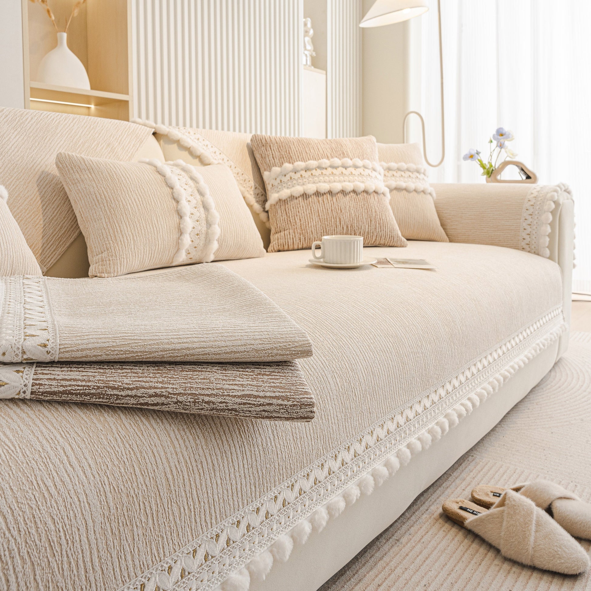 Soft Chenille Sectional Sofa Cover with Pom Pom Trim – Non-Slip Couch Protector in beige with decorative pillows