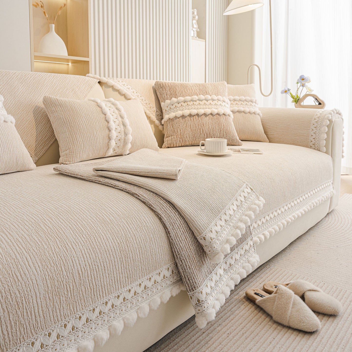 Soft Chenille Sectional Sofa Cover with Pom Pom Trim – Non-Slip Couch Protector in light interior setting