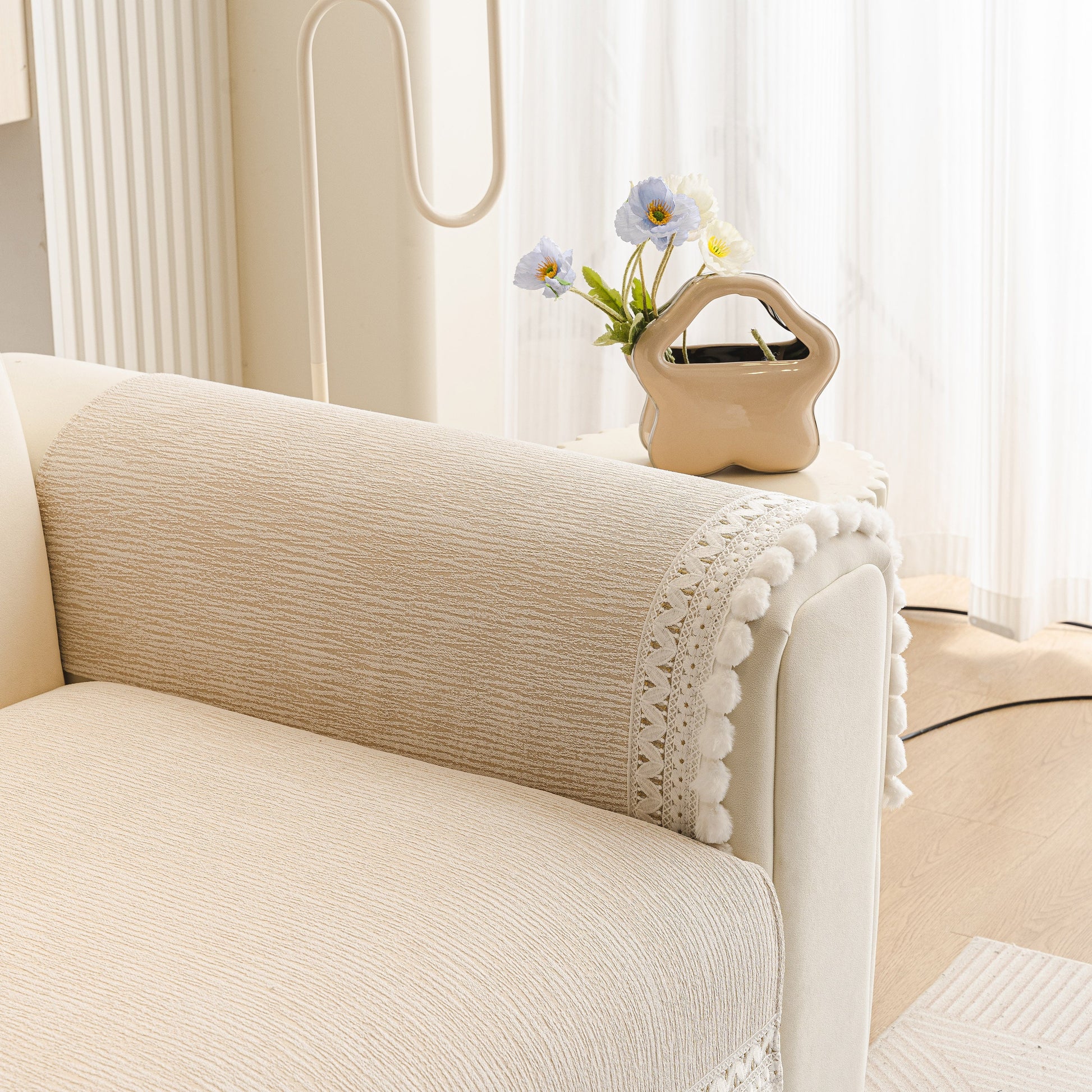 Soft Chenille Sectional Sofa Cover with Pom Pom Trim – Non-Slip Couch Protector in modern interior setting