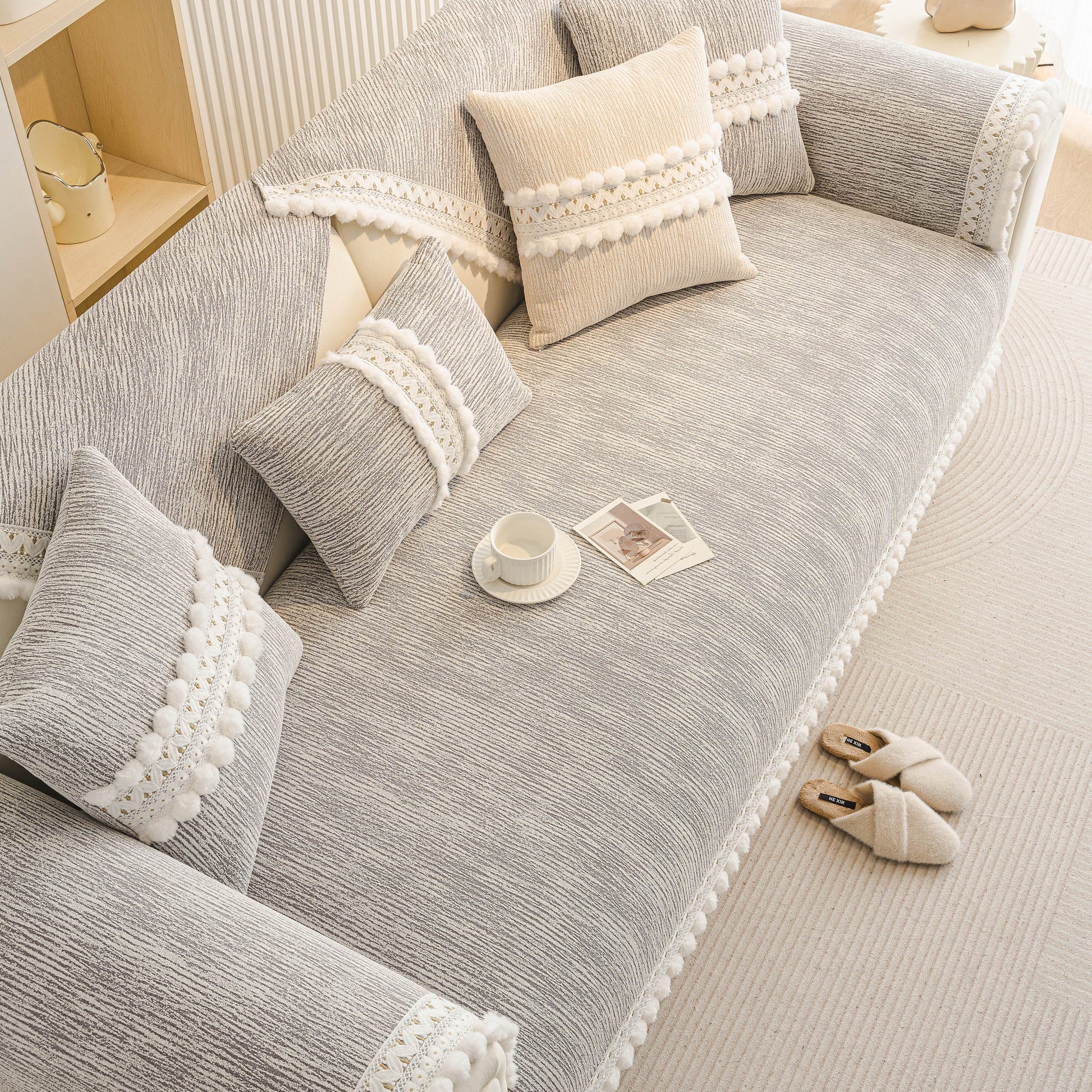 Soft Chenille Sectional Sofa Cover with Pom Pom Trim – Non-Slip Couch Protector on modern living room furniture.