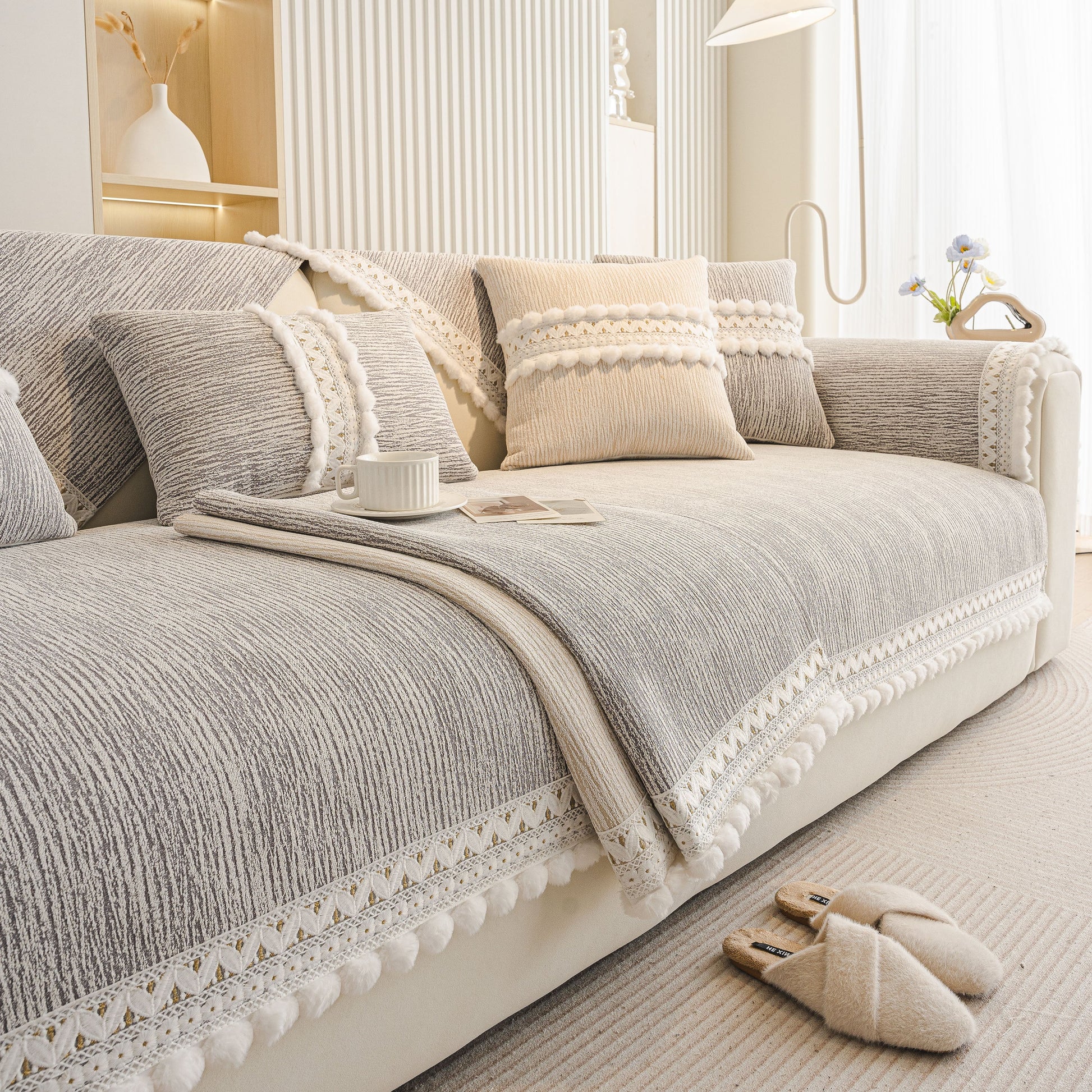 Soft Chenille Sectional Sofa Cover with Pom Pom Trim – Non-Slip Couch Protector displayed in a modern living room setting