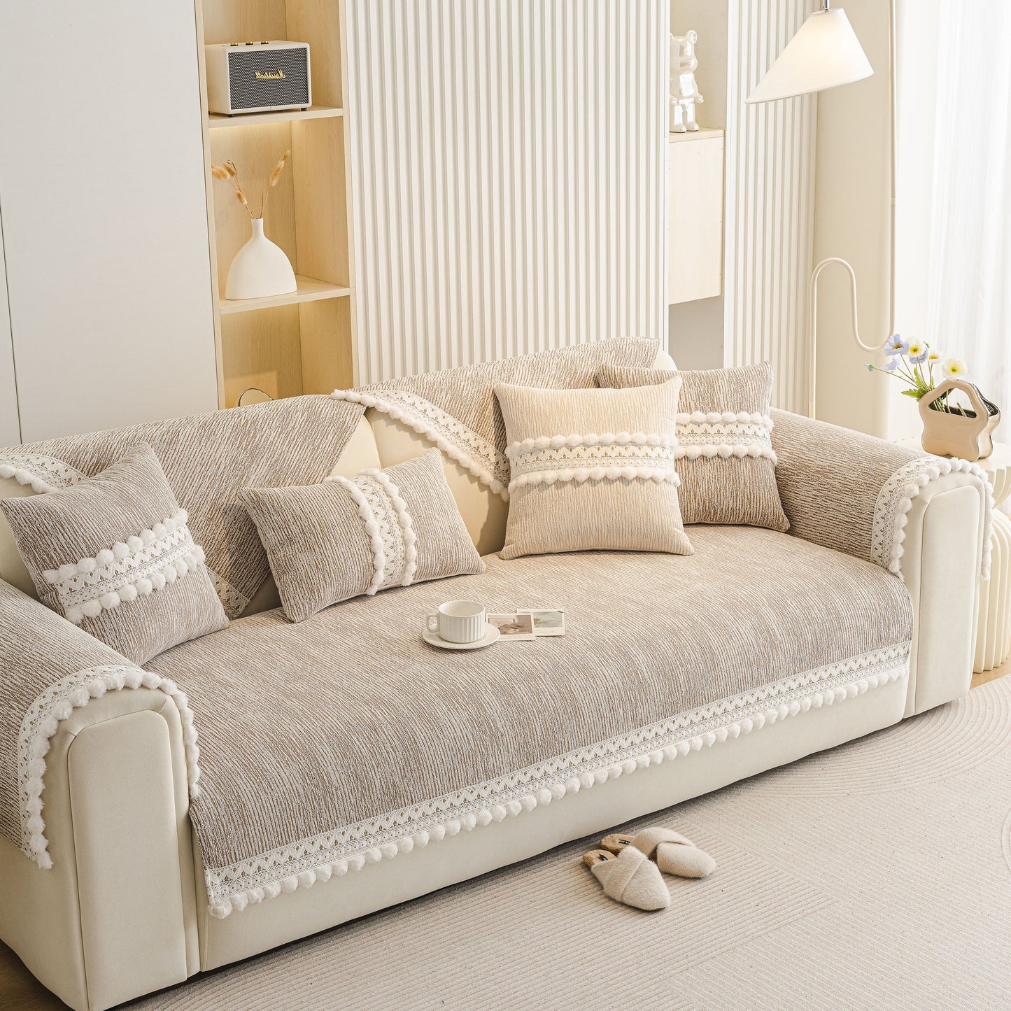 Soft Chenille Sectional Sofa Cover with Pom Pom Trim – Non-Slip Couch Protector displayed in modern living room setting