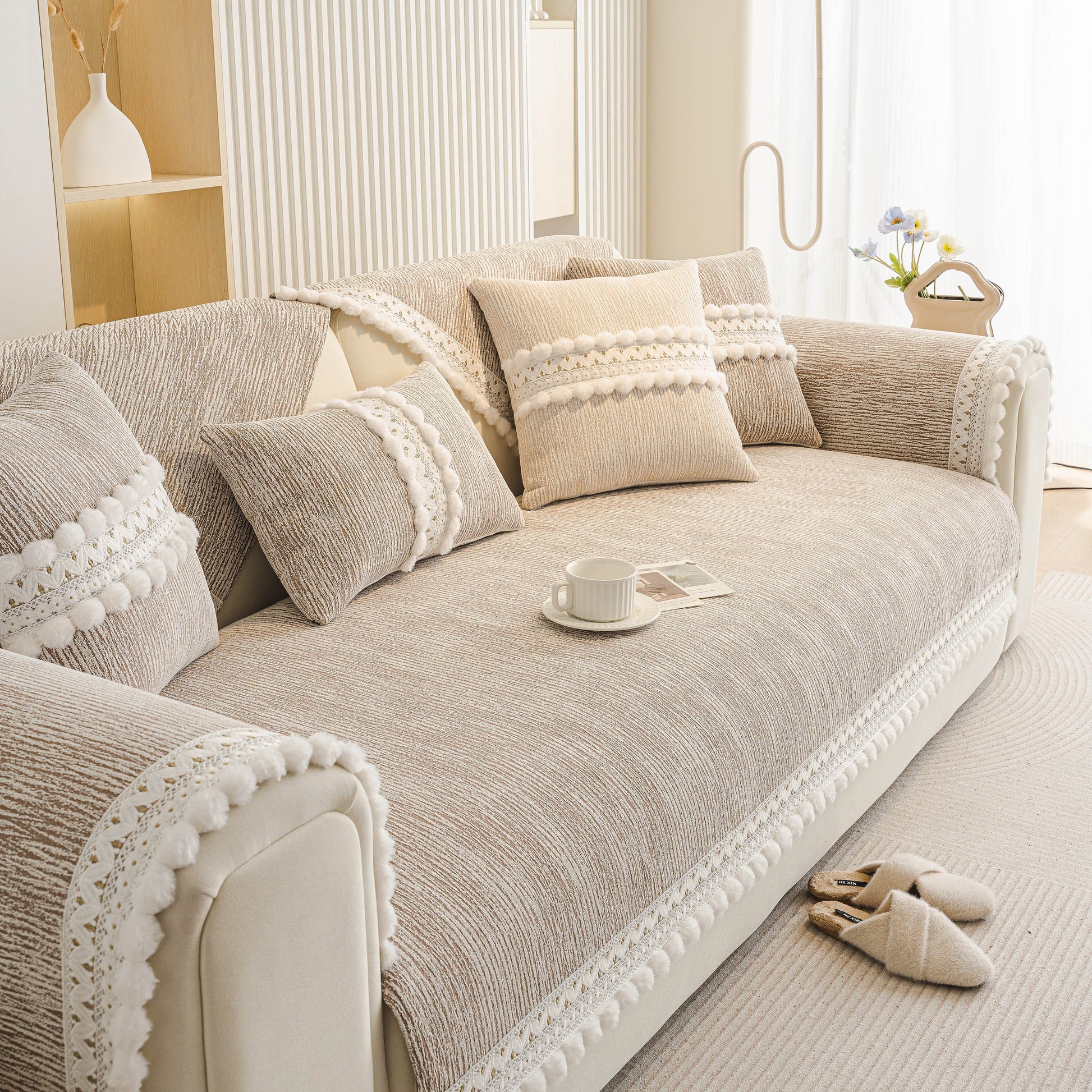 Soft Chenille Sectional Sofa Cover with Pom Pom Trim – Non-Slip Couch Protector in a modern living room setting