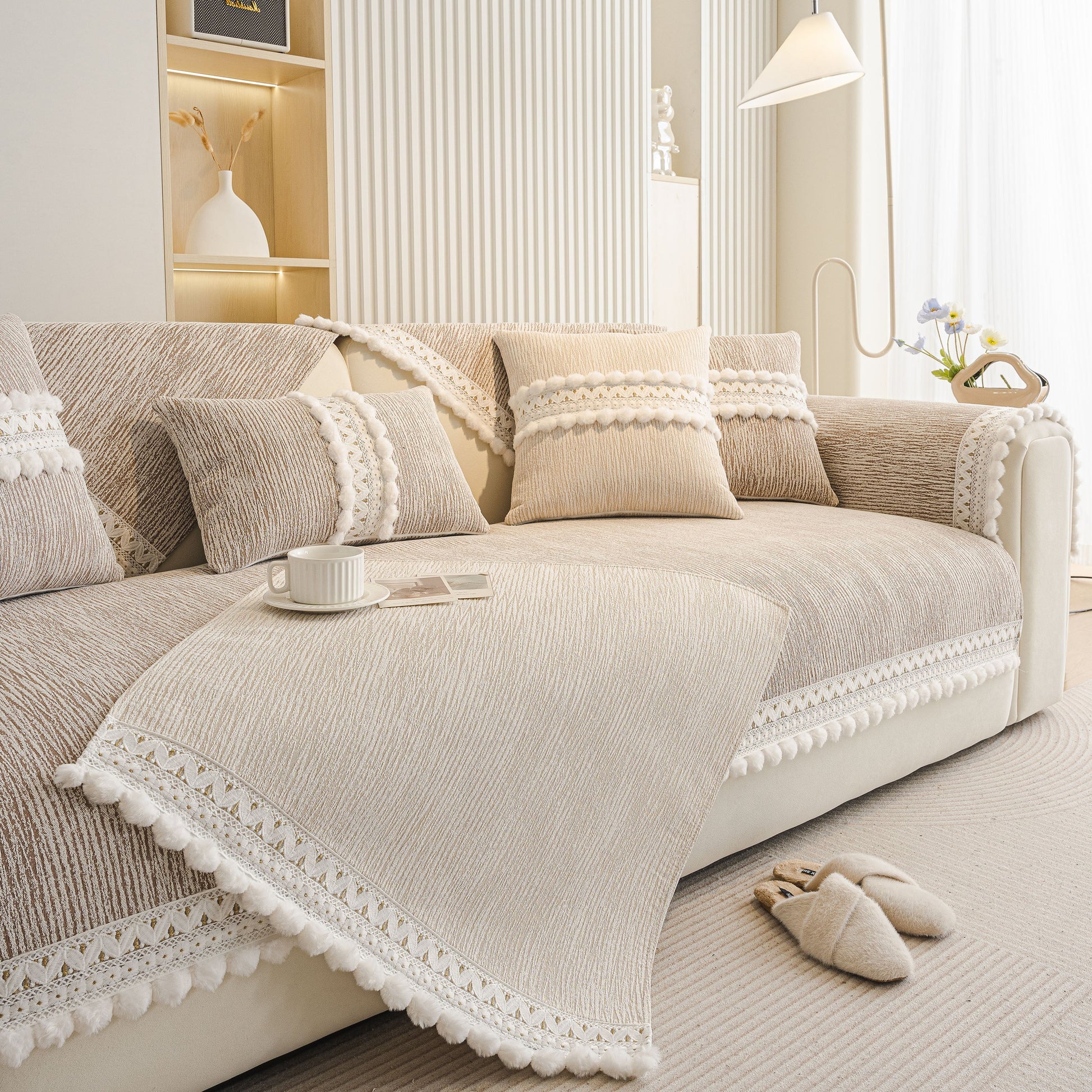 Soft Chenille Sectional Sofa Cover with Pom Pom Trim – Non-Slip Couch Protector featuring lace and pom pom fringe details in modern room.