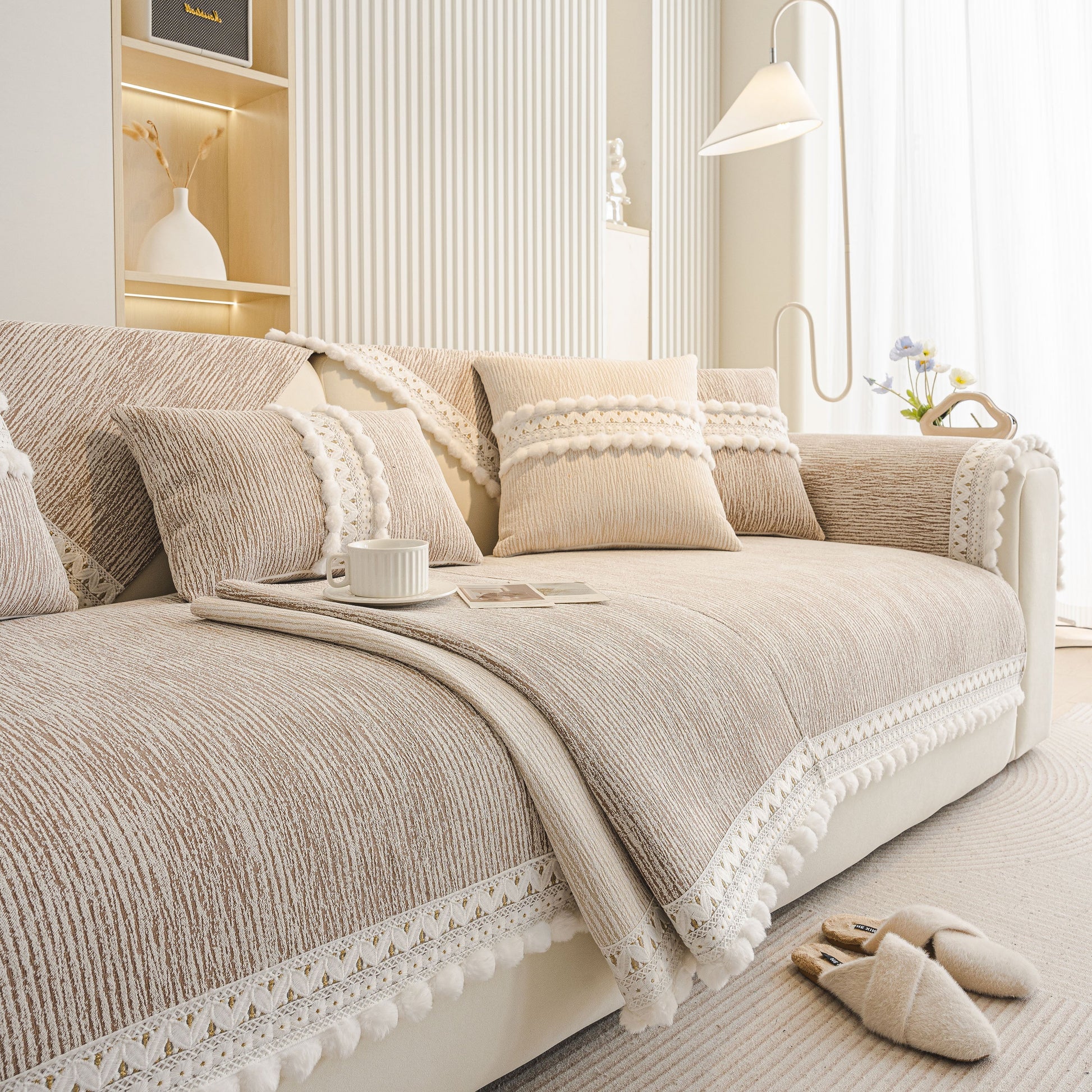Soft Chenille Sectional Sofa Cover with Pom Pom Trim – Non-Slip Couch Protector in a modern styled living room.