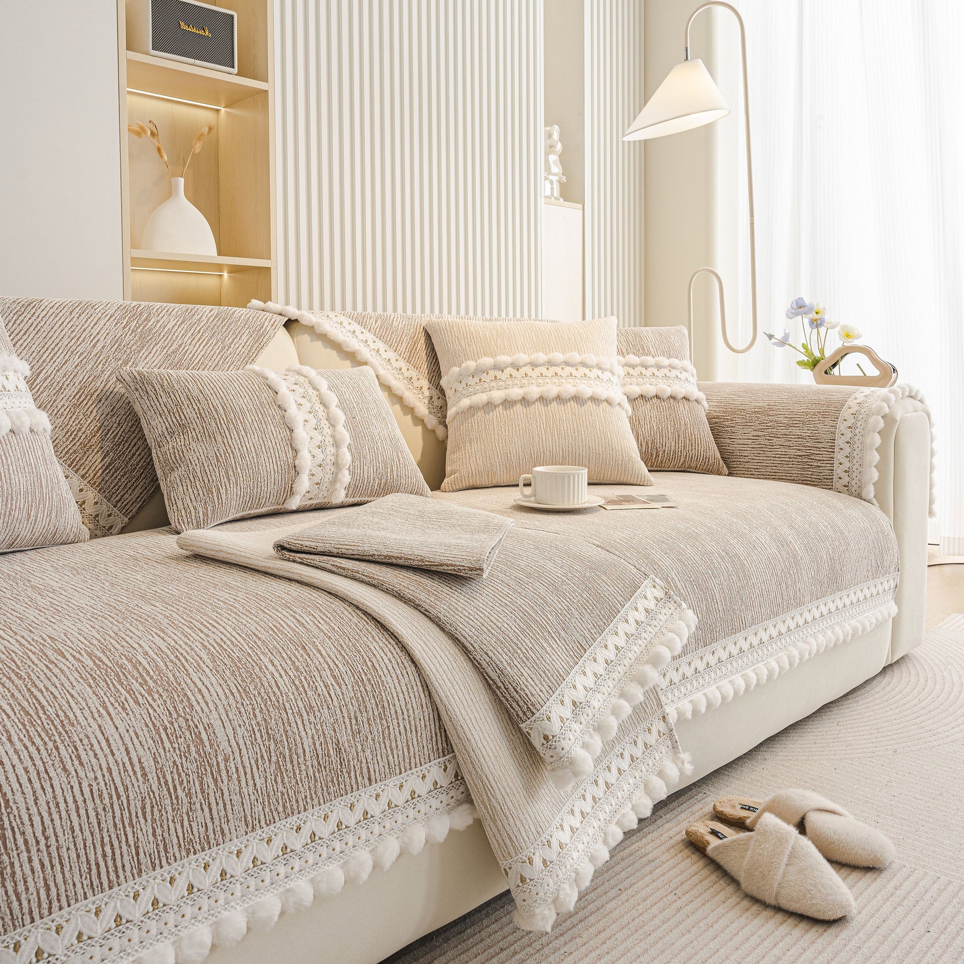 Soft Chenille Sectional Sofa Cover with Pom Pom Trim – Non-Slip Couch Protector in a modern living room setting.