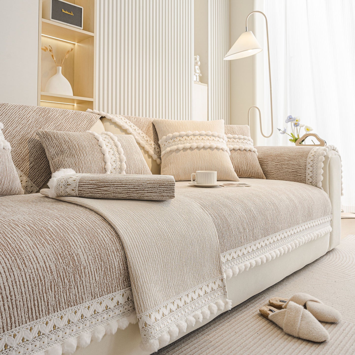 Soft Chenille Sectional Sofa Cover with Pom Pom Trim – Non-Slip Couch Protector in a cozy modern living room setting.