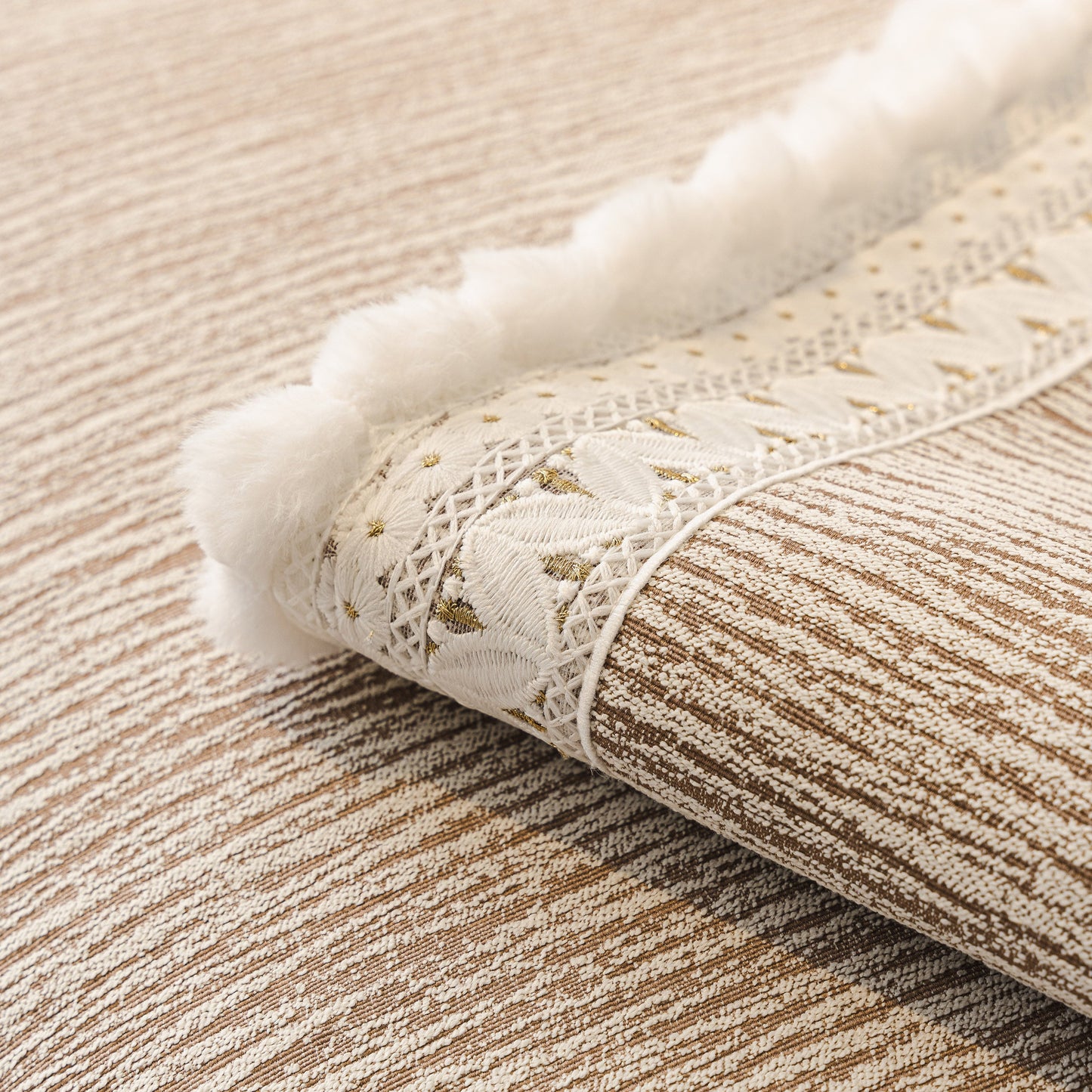 Close-up of Soft Chenille Sectional Sofa Cover with Pom Pom Trim – Non-Slip Couch Protector, showing texture and lace details.