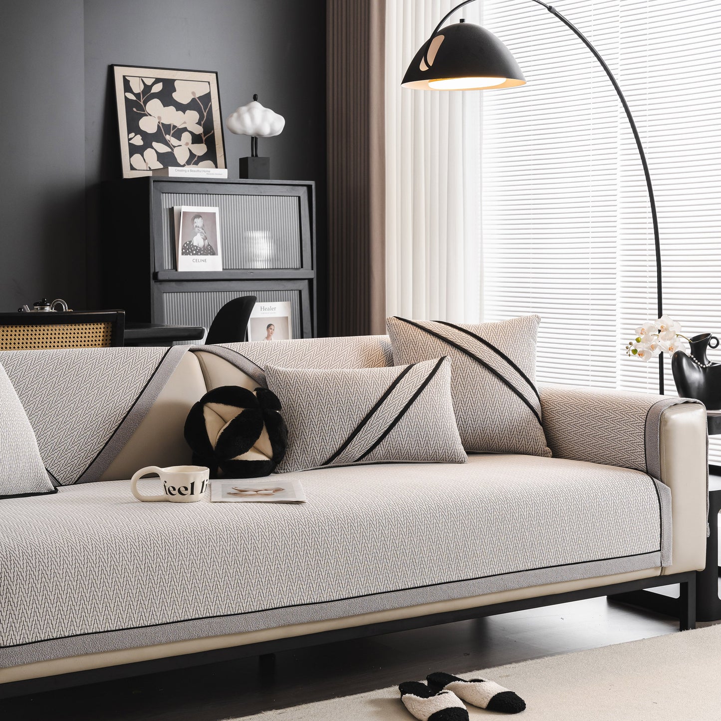 Living room featuring a sofa with Herringbone Couch Protector for Pets, Non-Slip Washable Sectional Couch Covers in a modern setting.