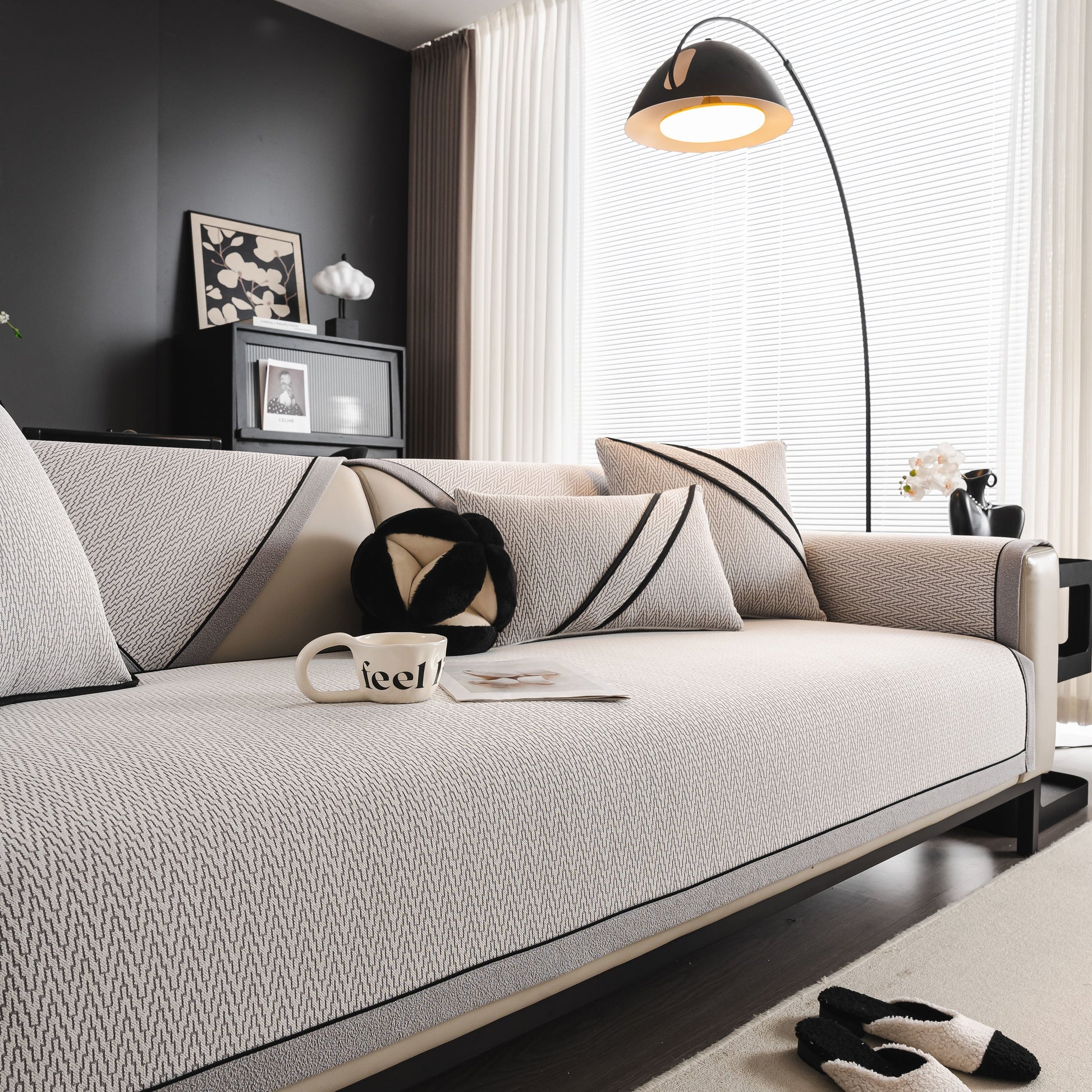 Modern living room with Herringbone Couch Protector for Pets, Non-Slip Washable Sectional Couch Covers on a stylish sofa.
