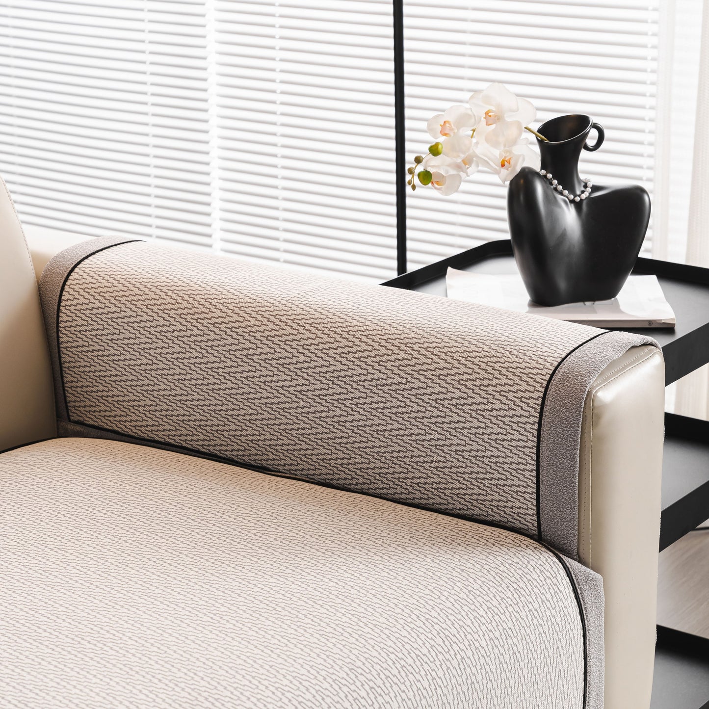 Herringbone Couch Protector for Pets, Non-Slip Washable Sectional Couch Covers on a sofa arm with herringbone texture.