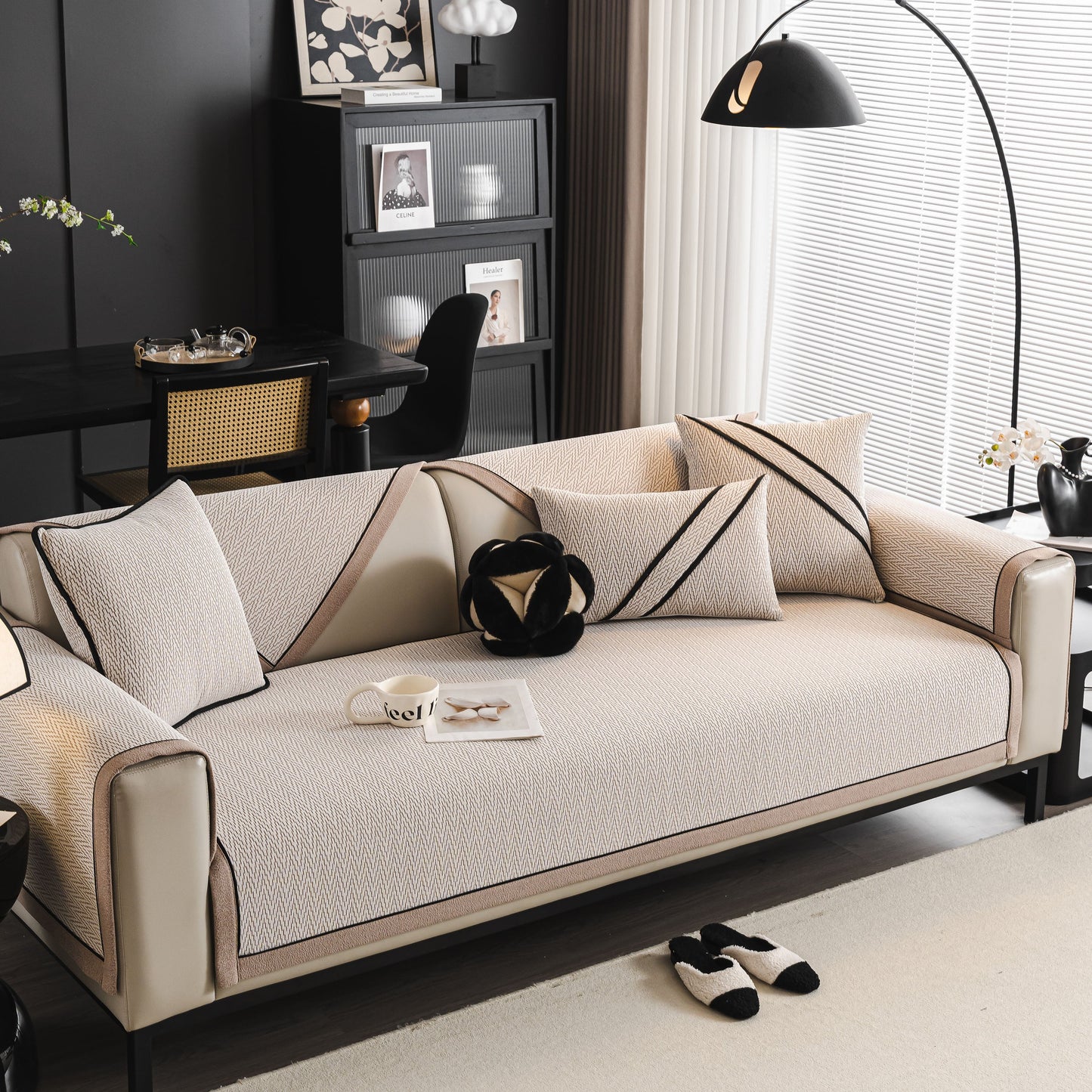 Modern living room with beige sofa featuring Herringbone Couch Protector for Pets, Non-Slip Washable Sectional Couch Covers, stylish decor.