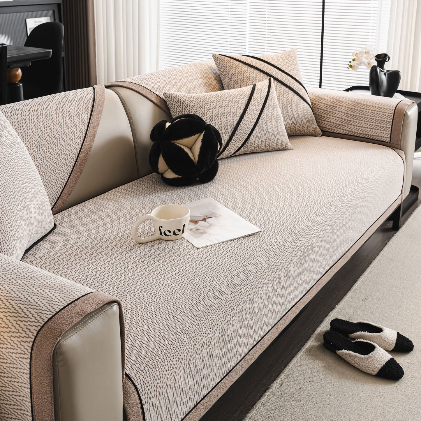 Herringbone Couch Protector for Pets, Non-Slip Washable Sectional Couch Covers on a beige sofa with pillows and a coffee cup