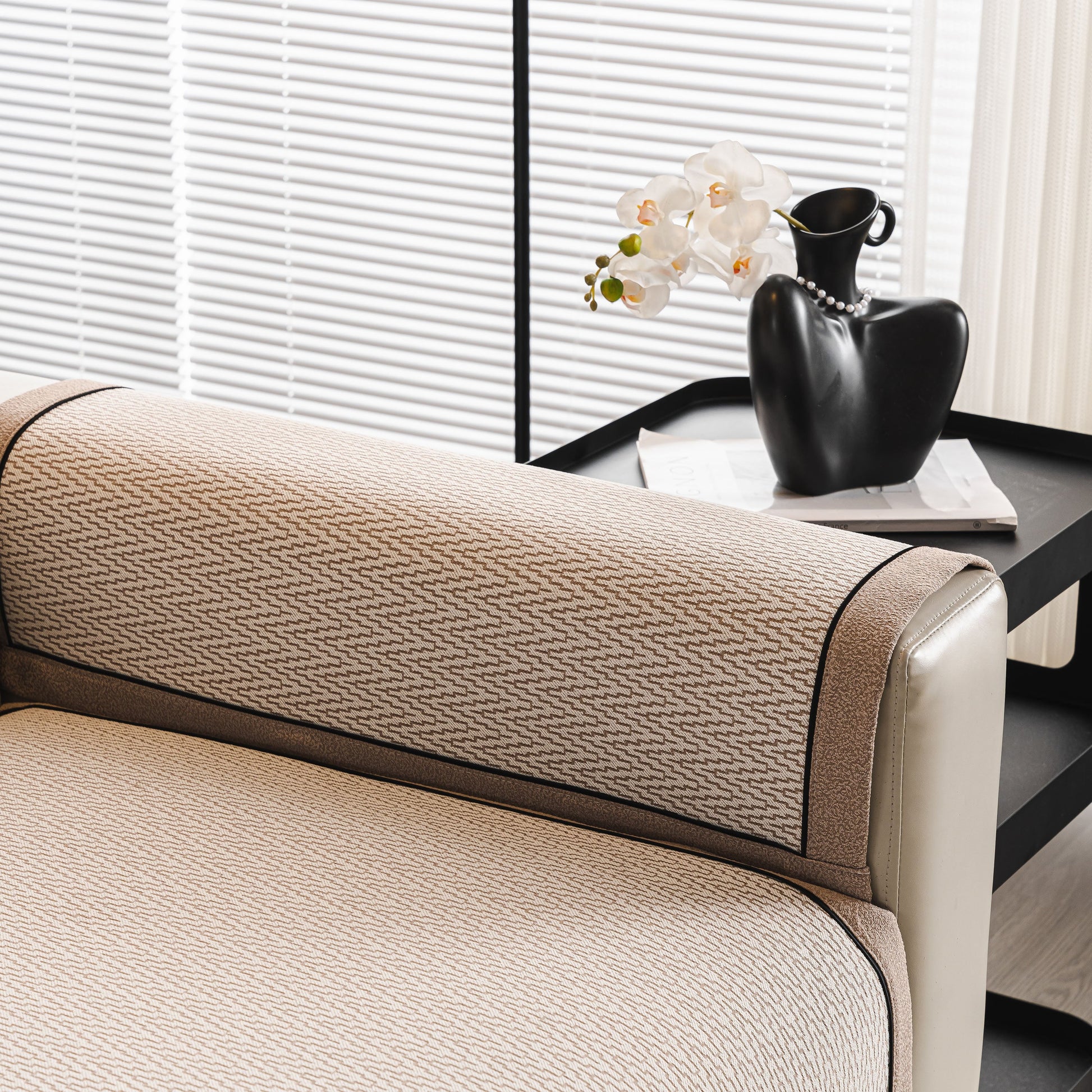 Herringbone Couch Protector for Pets, Non-Slip Washable Sectional Couch Covers on sofa with vase and orchid.
