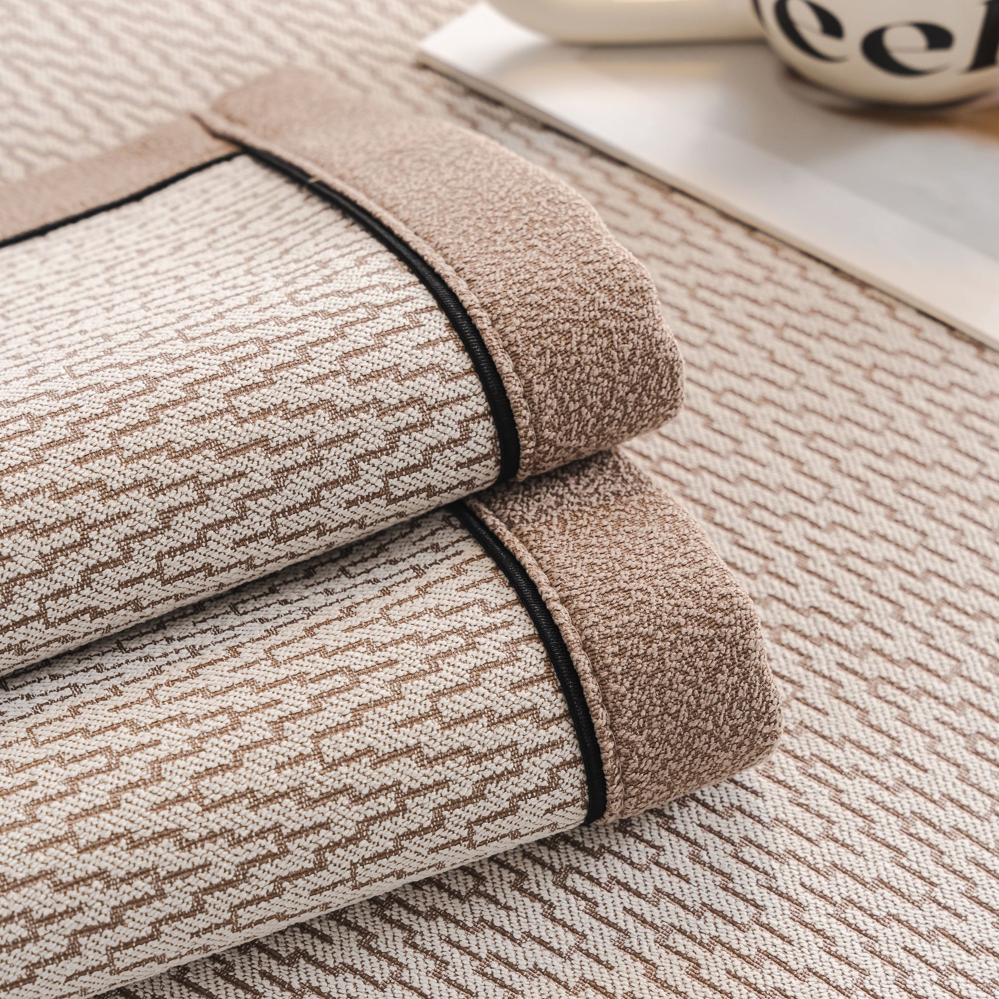 Close-up of Herringbone Couch Protector for Pets, Non-Slip Washable Sectional Couch Covers in chenille fabric with piped edges.