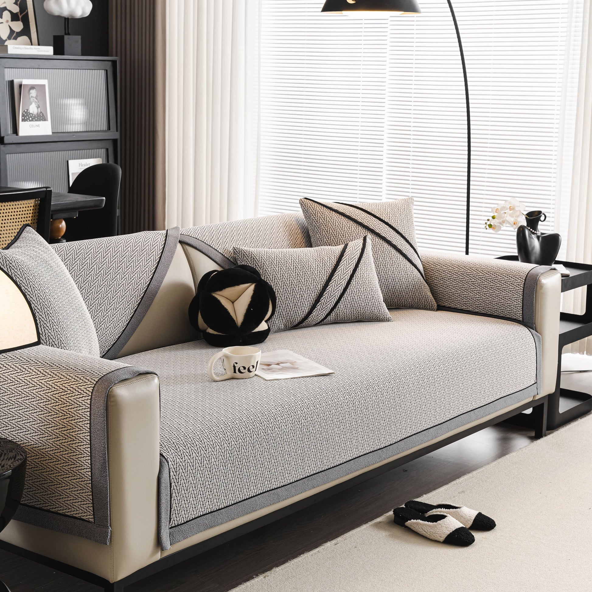 Herringbone Couch Protector for Pets, Non-Slip Washable Sectional Couch Covers on modern sofa with pillows and decor.