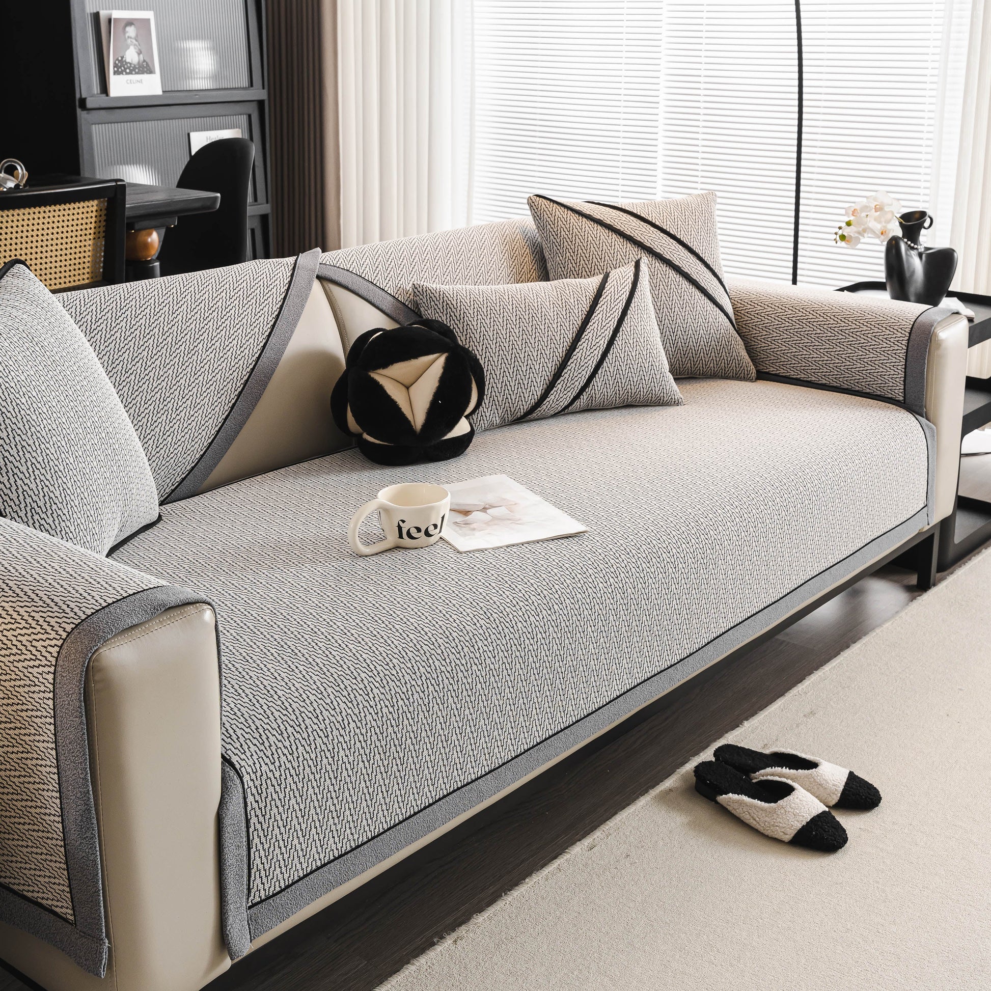 Herringbone Couch Protector for Pets, Non-Slip Washable Sectional Couch Covers on modern sofa with decorative pillows.