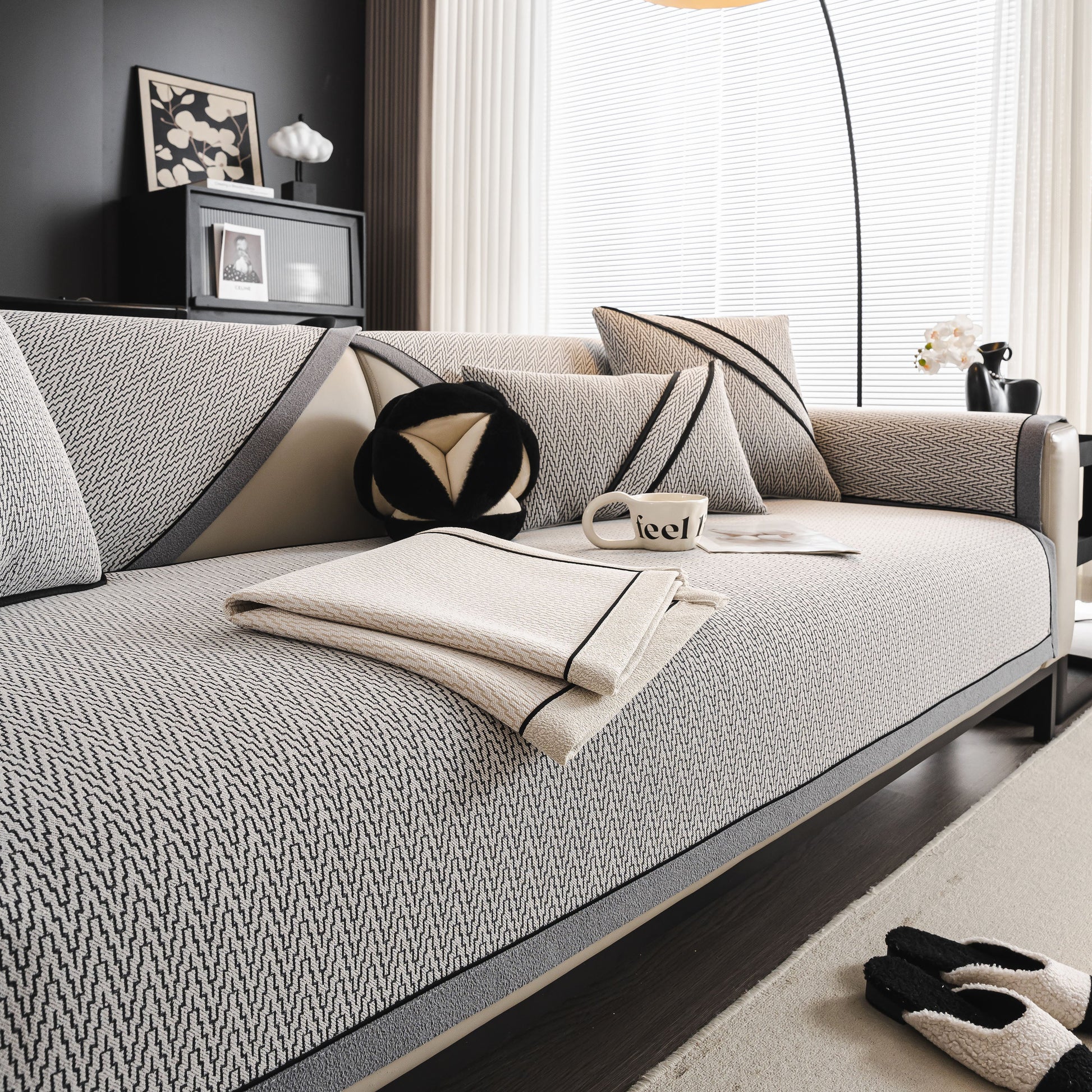Herringbone Couch Protector for Pets, Non-Slip Washable Sectional Couch Covers on modern sofa with decorative pillows.
