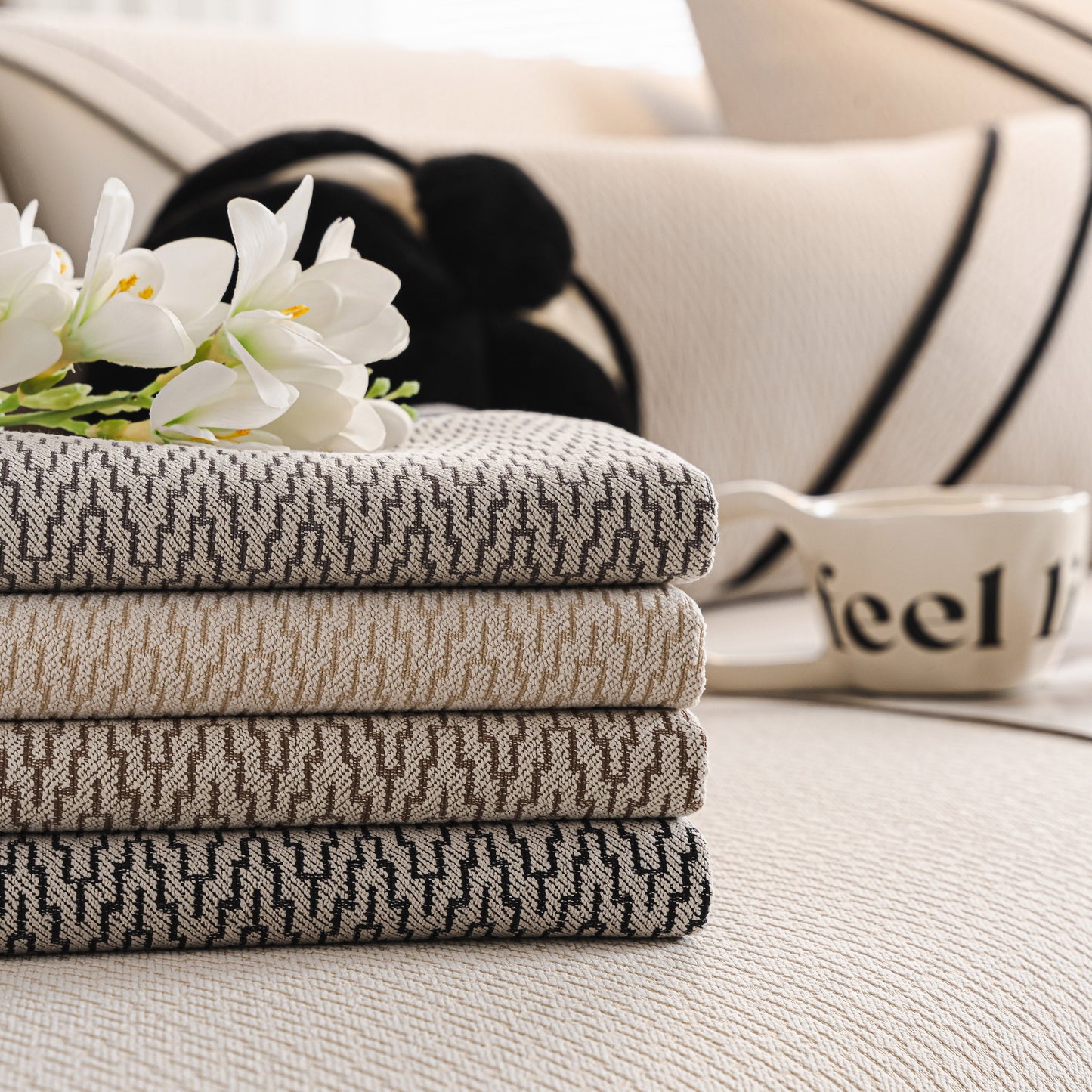 Herringbone Couch Protector for Pets, Non-Slip Washable Sectional Couch Covers displayed with floral decor.