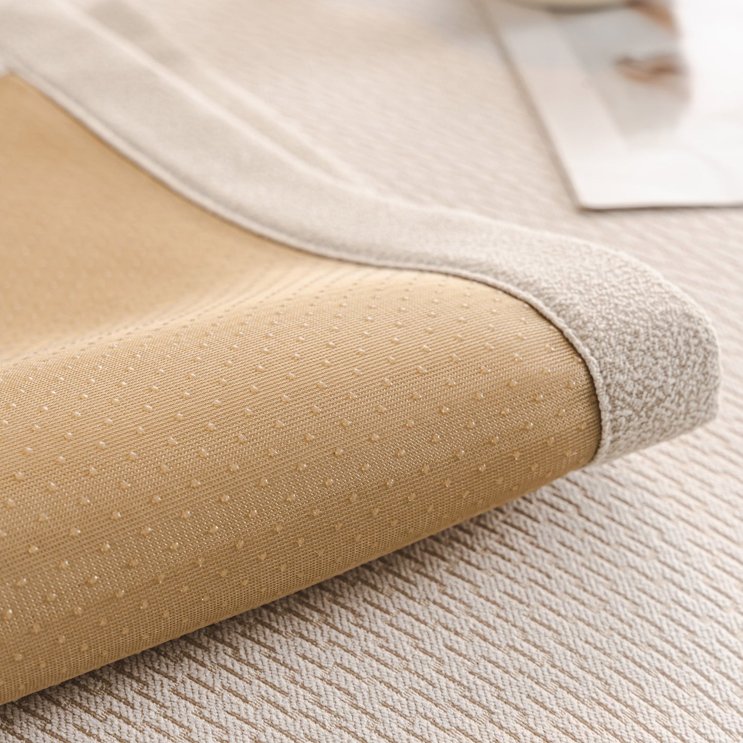 Close-up of Herringbone Couch Protector for Pets with non-slip silicone dots and chenille fabric, showcasing texture and design.