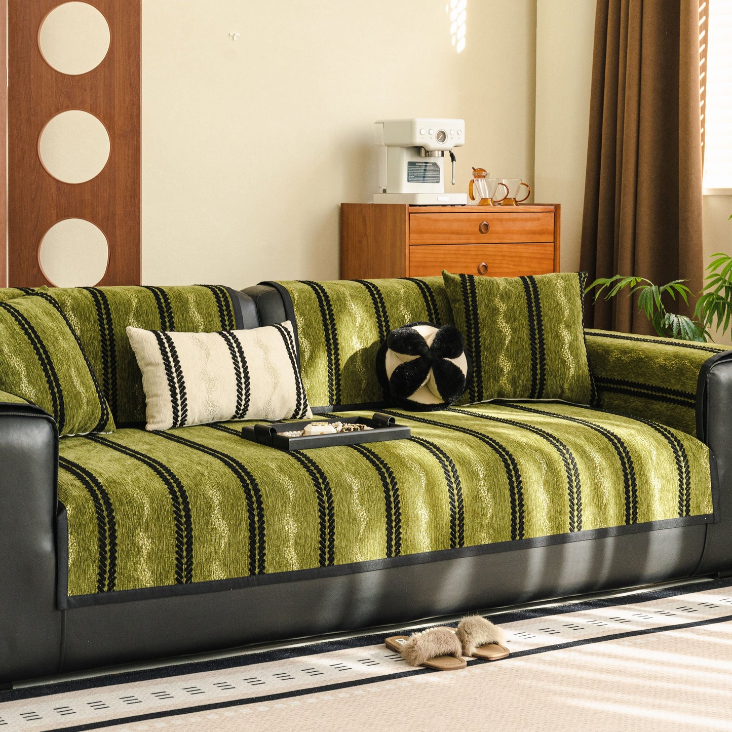 Non-Slip Sofa Cover with Thick Chenille Texture Woven Stripe Couch Protector Throw on a modern green sofa.
