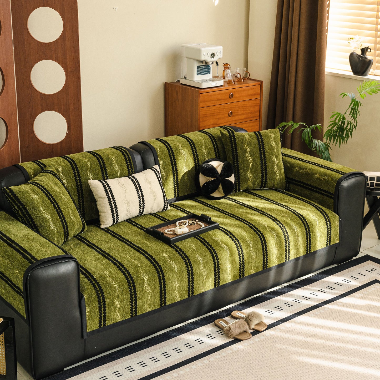 Non-Slip Sofa Cover with Thick Chenille Texture Woven Stripe Couch Protector Throw on a green sofa in a cozy living room.