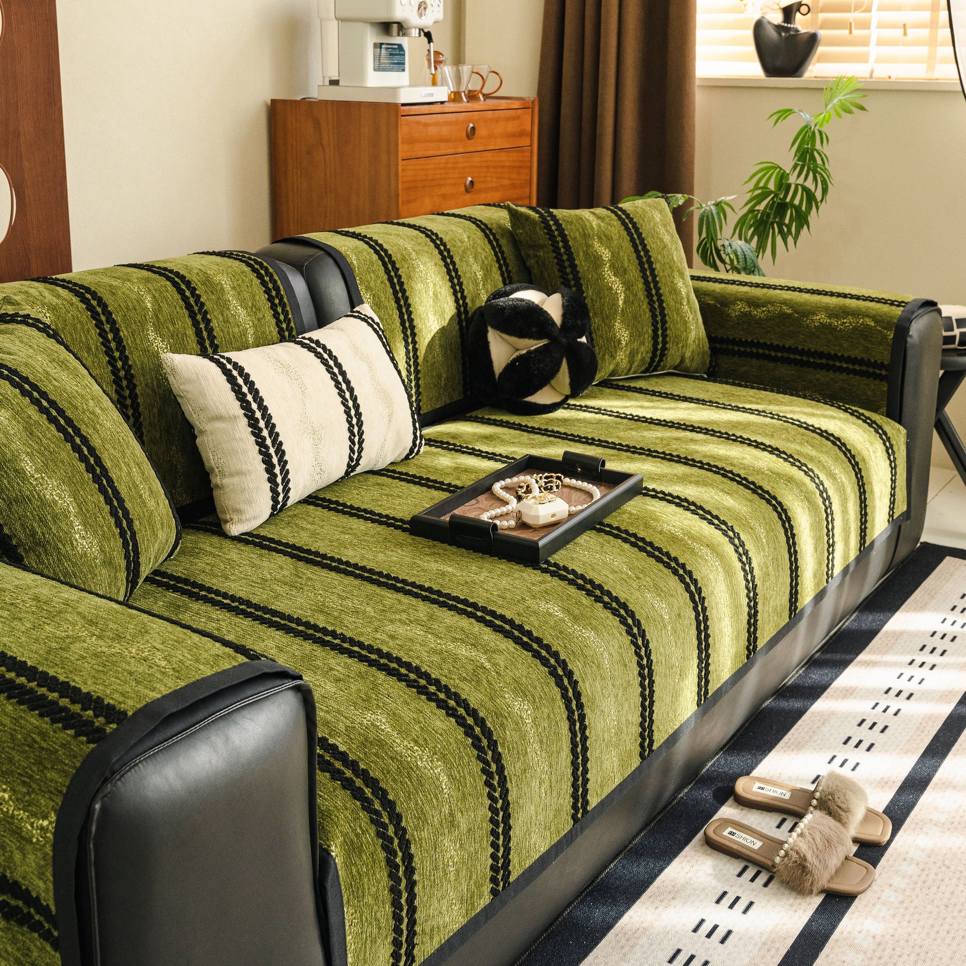 Non-Slip Sofa Cover with Thick Chenille Texture Woven Stripe Couch Protector Throw in green with striped design on a sofa.