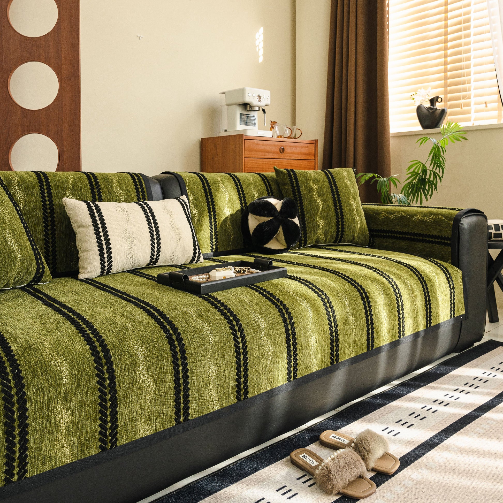 Non-Slip Sofa Cover with Thick Chenille Texture Woven Stripe Couch Protector Throw on green sofa in living room.