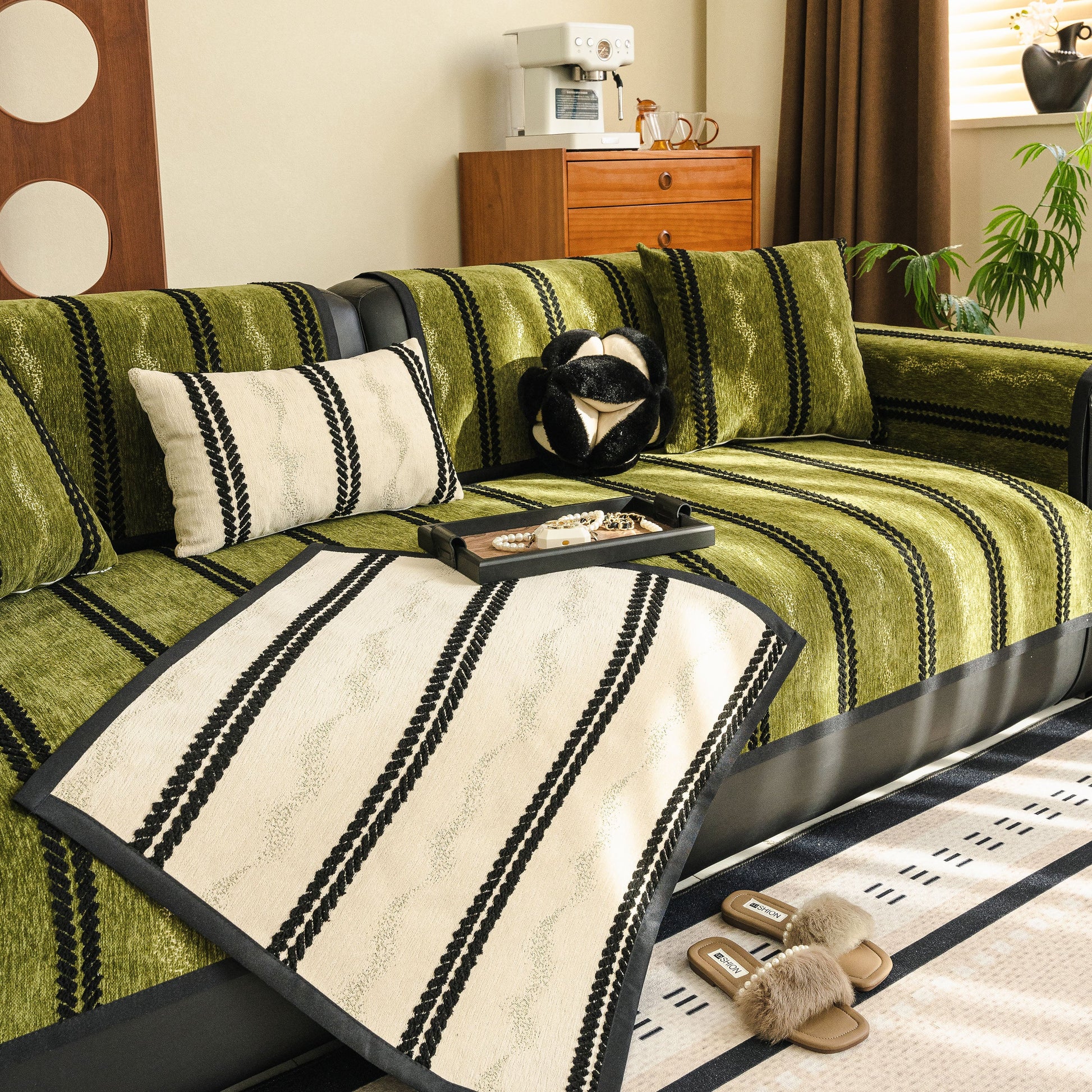 Non-Slip Sofa Cover with Thick Chenille Texture Woven Stripe Couch Protector Throw on green sofa with matching pillows.