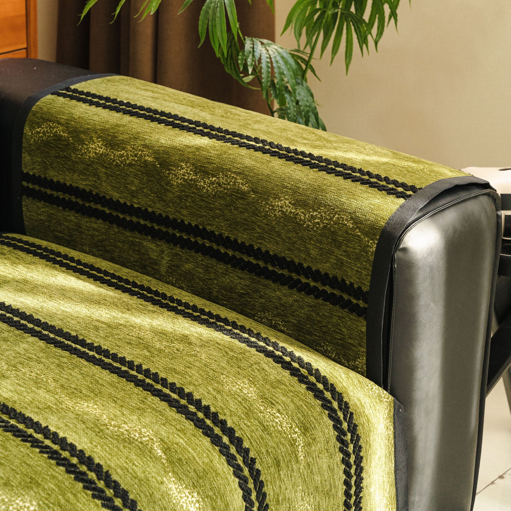 Non-Slip Sofa Cover with Thick Chenille Texture Woven Stripe Couch Protector Throw on a leather sofa