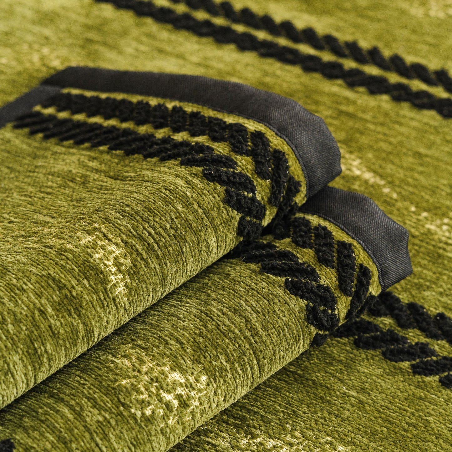 Non-Slip Sofa Cover with Thick Chenille Texture Woven Stripe Couch Protector Throw in green texture with black 3D trim.