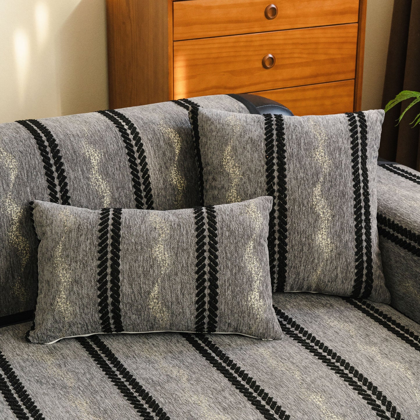 Non-Slip Sofa Cover with Thick Chenille Texture Woven Stripe Couch Protector Throw on sofa with cushions, showing textured look